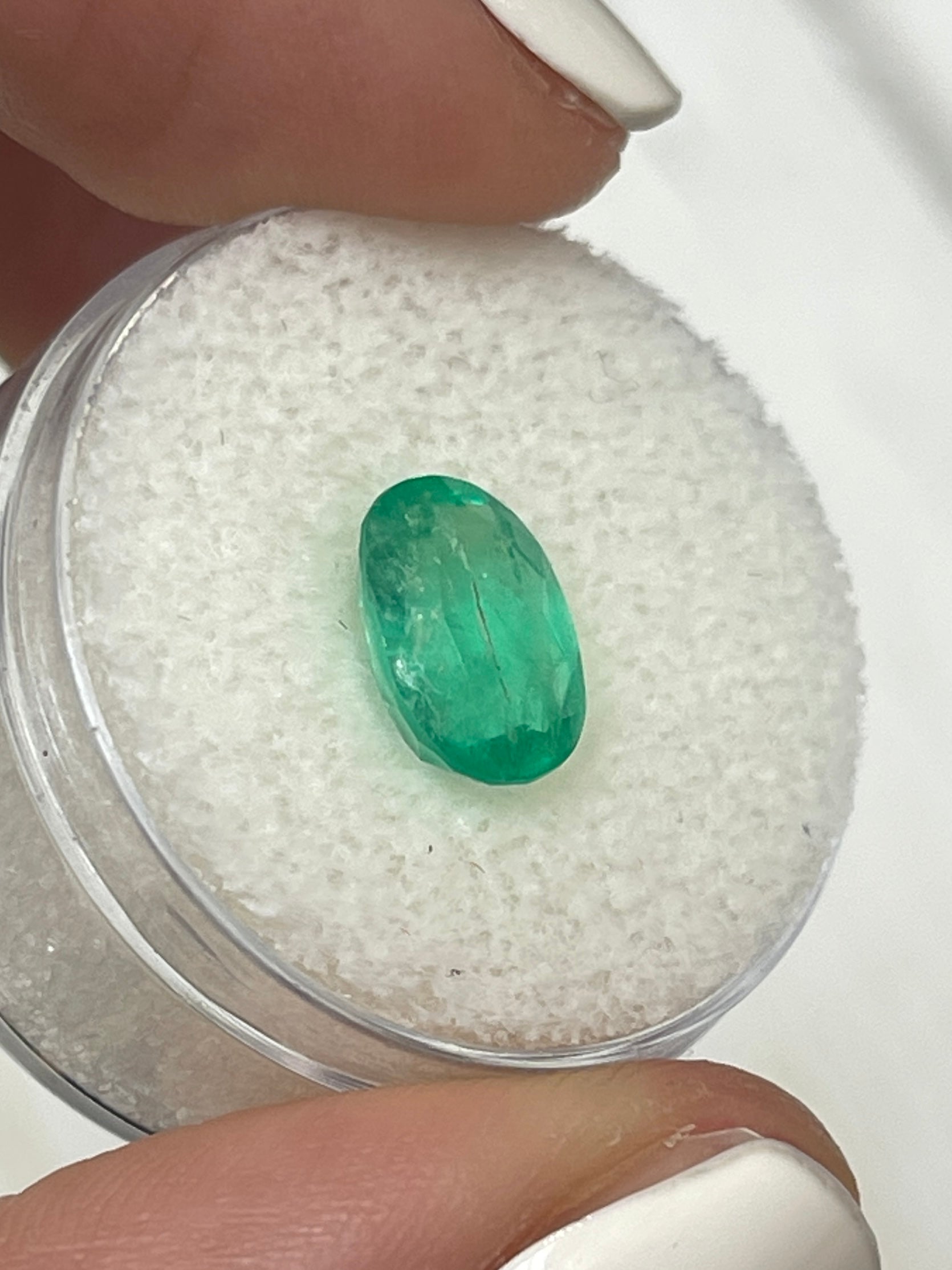 2.19 carat oval cut green natural Colombian emerald loose gemstone from JR Colombian Emeralds.