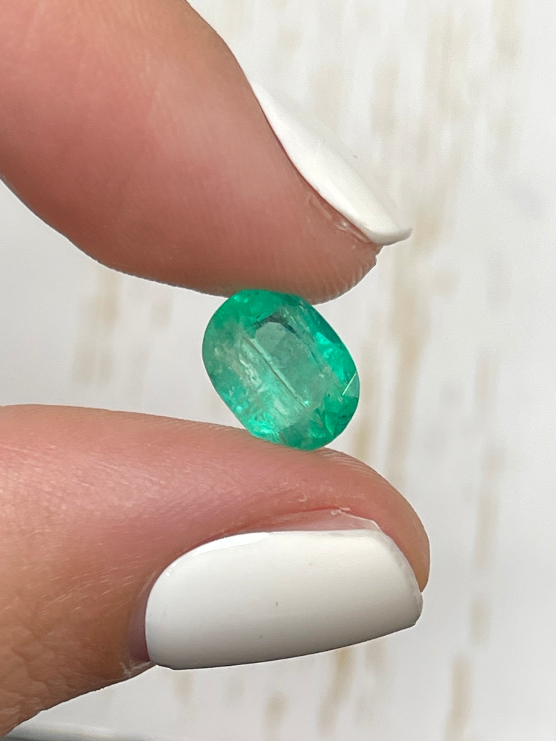 2.19 carat natural green Colombian emerald loose oval cut gemstone from JR Colombian Emeralds.