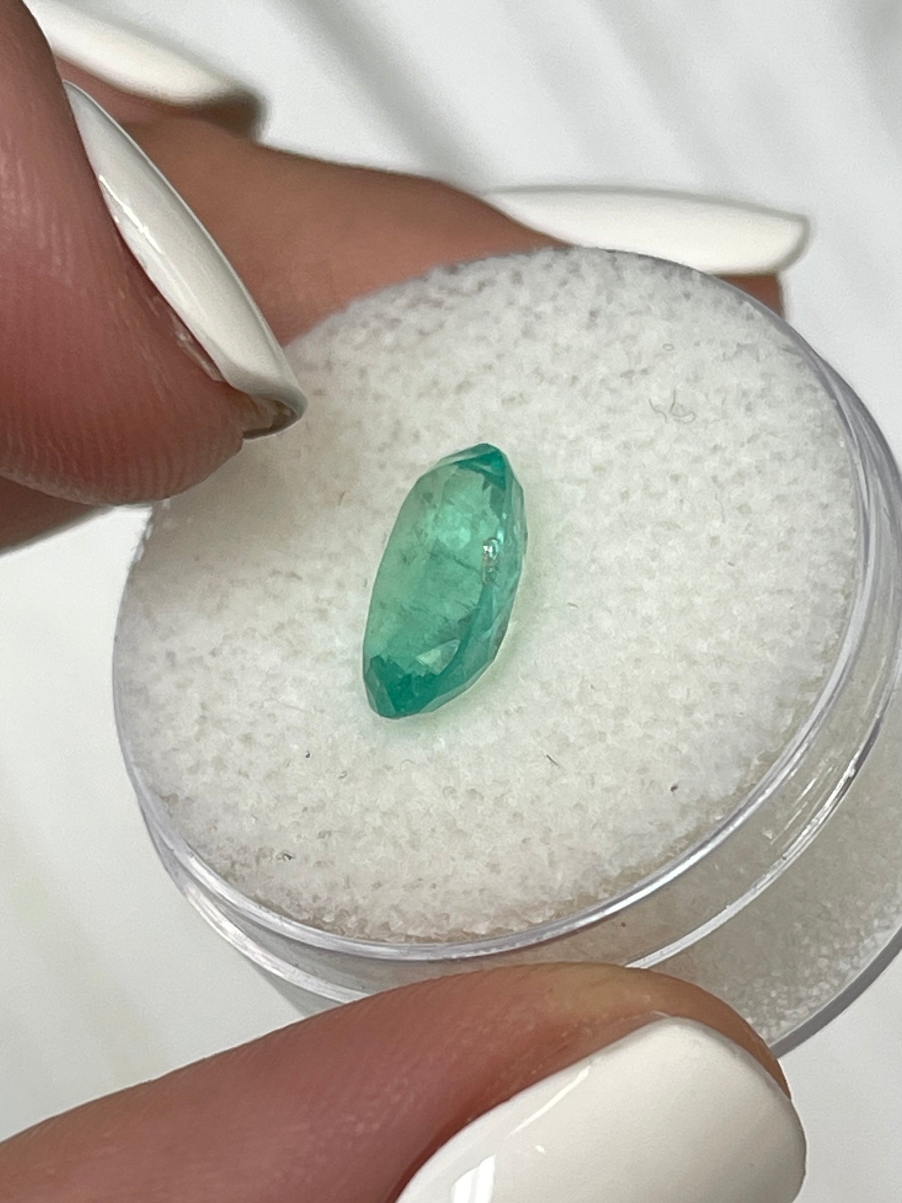 Light bluish green 2.22 carat natural Colombian emerald in oval cut, loose gemstone from JR Colombian Emeralds.