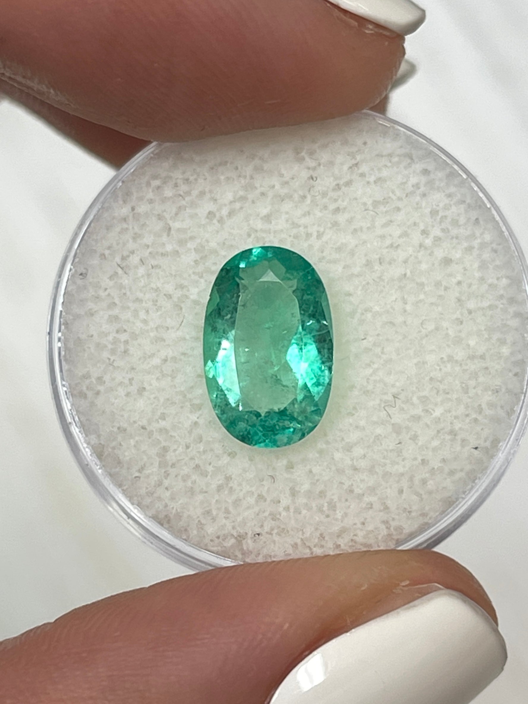 2.31 Carat elongated oval green natural Colombian emerald loose gemstone from JR Colombian Emeralds.