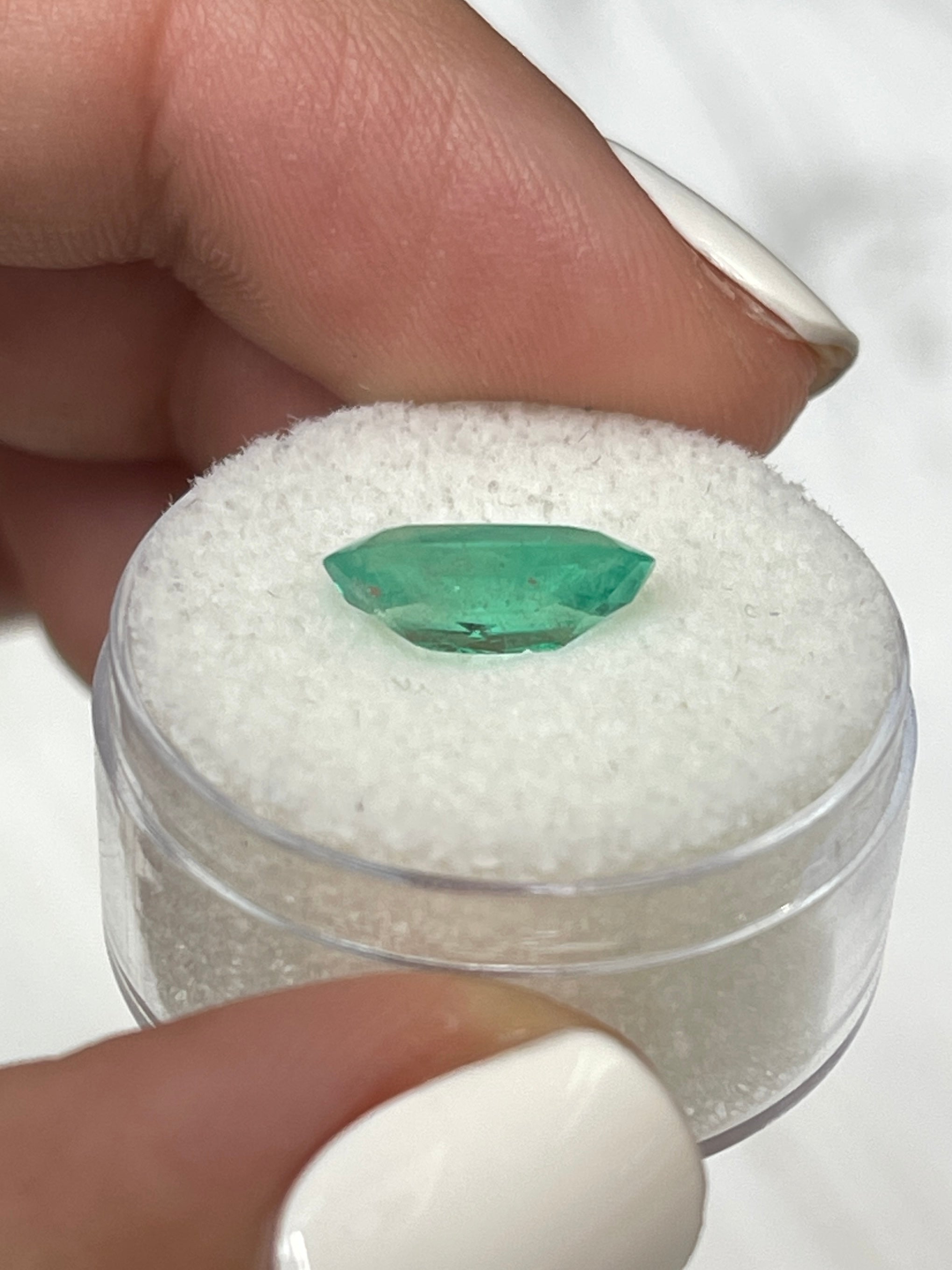 2.31 carat elongated oval Colombian emerald from JR Colombian Emeralds, natural green loose gemstone with clarity and vibrant color