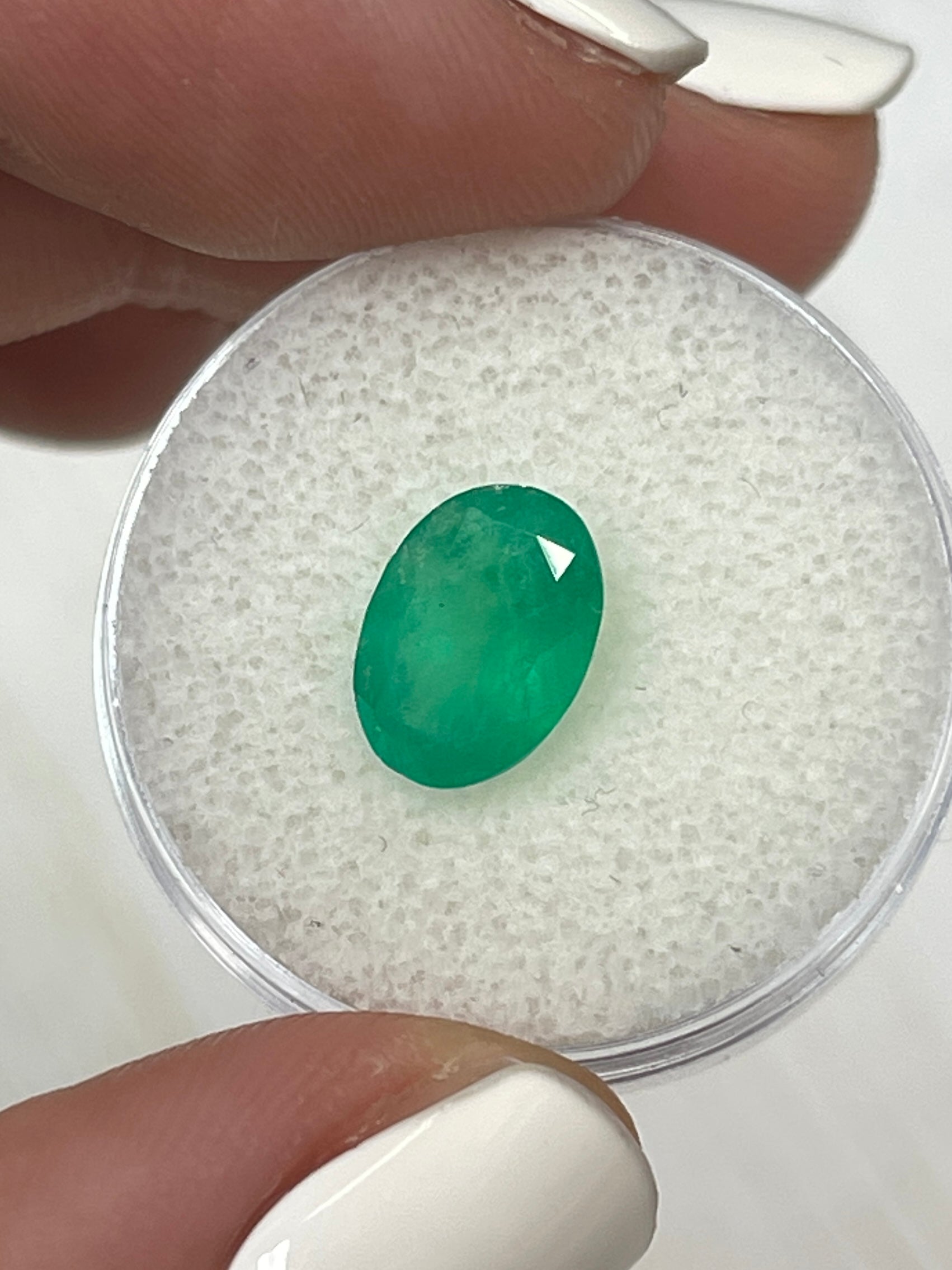 Medium forest green 2.33 carat natural Colombian emerald in oval cut, loose gemstone by JR Colombian Emeralds.