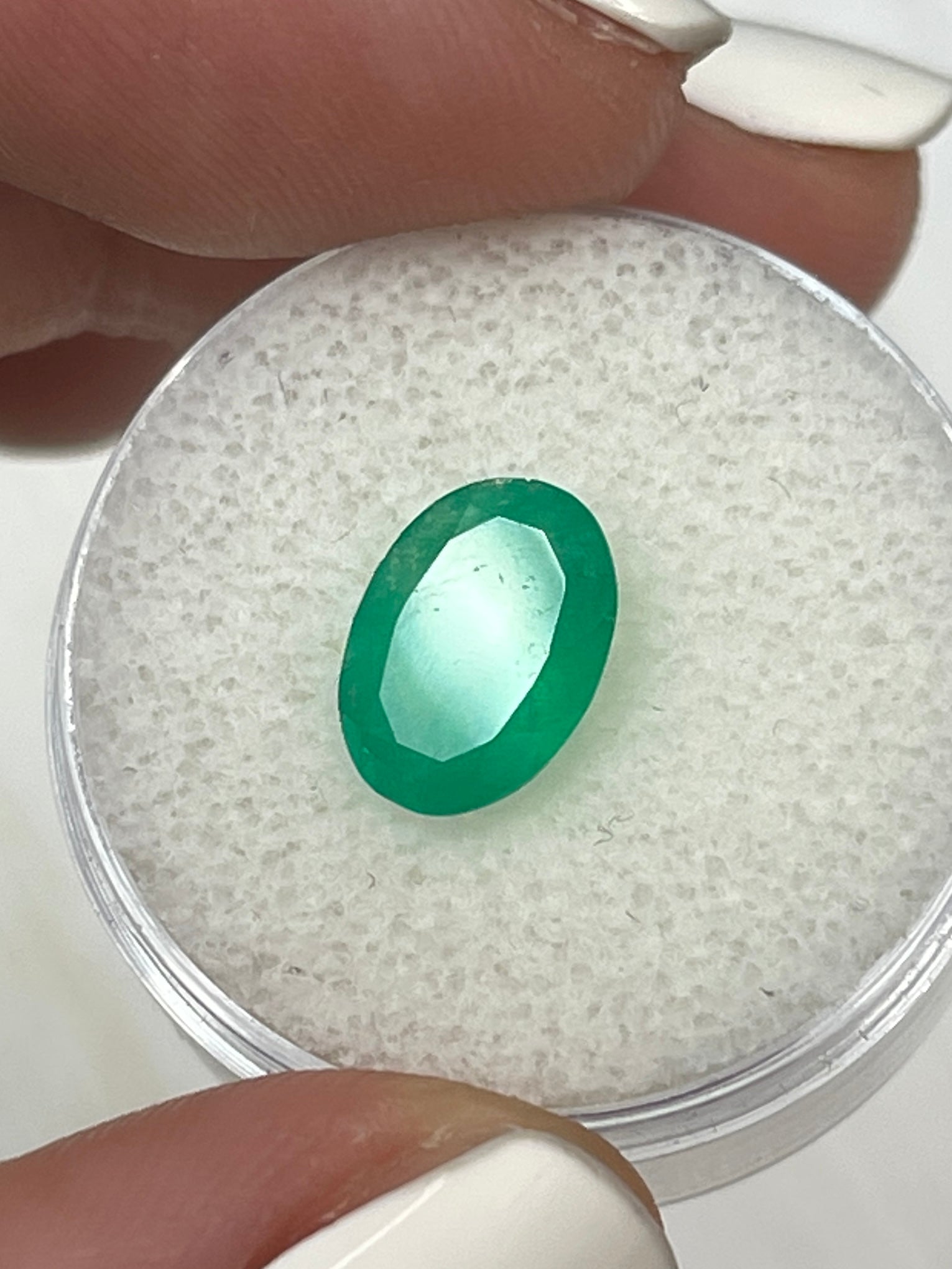 Medium forest green Colombian emerald loose oval cut gemstone, 2.33 carats, natural and vivid, from JR Colombian Emeralds.