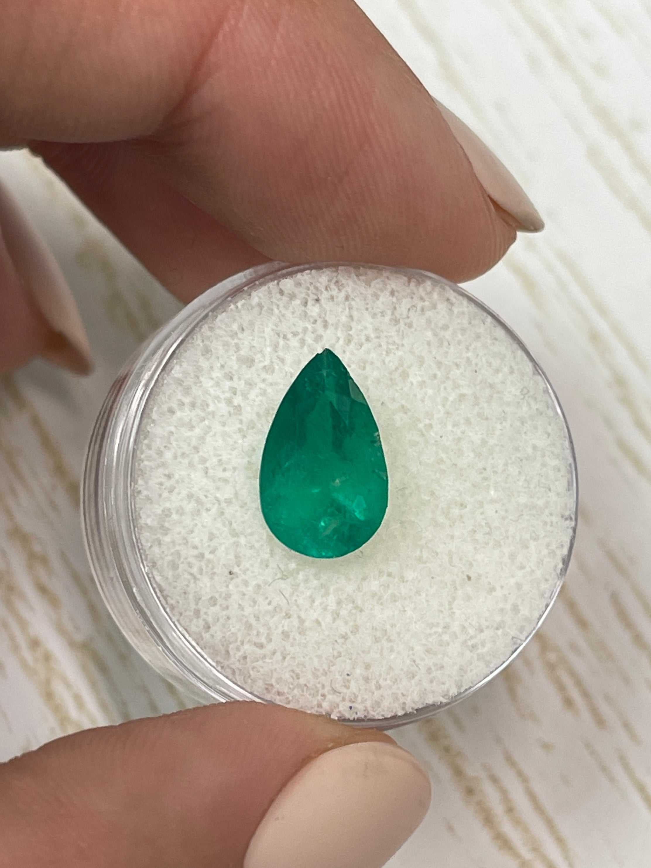 2.34 carat intense green natural Colombian emerald loose pear cut gemstone from JR Colombian Emeralds.