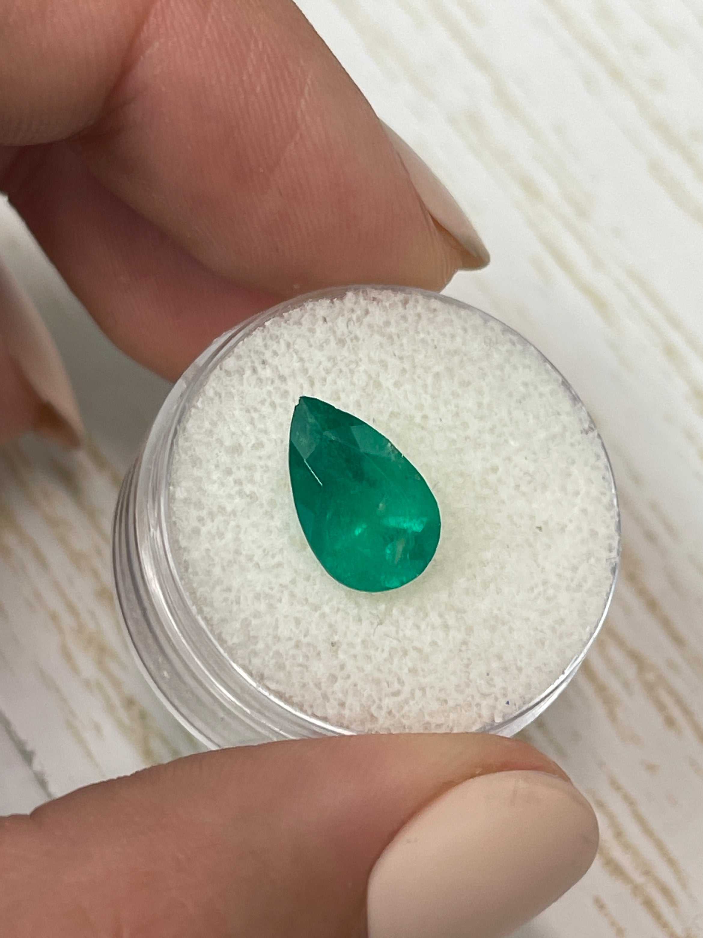 2.34 carat intense green natural Colombian emerald in pear cut, loose gemstone from JR Colombian Emeralds.