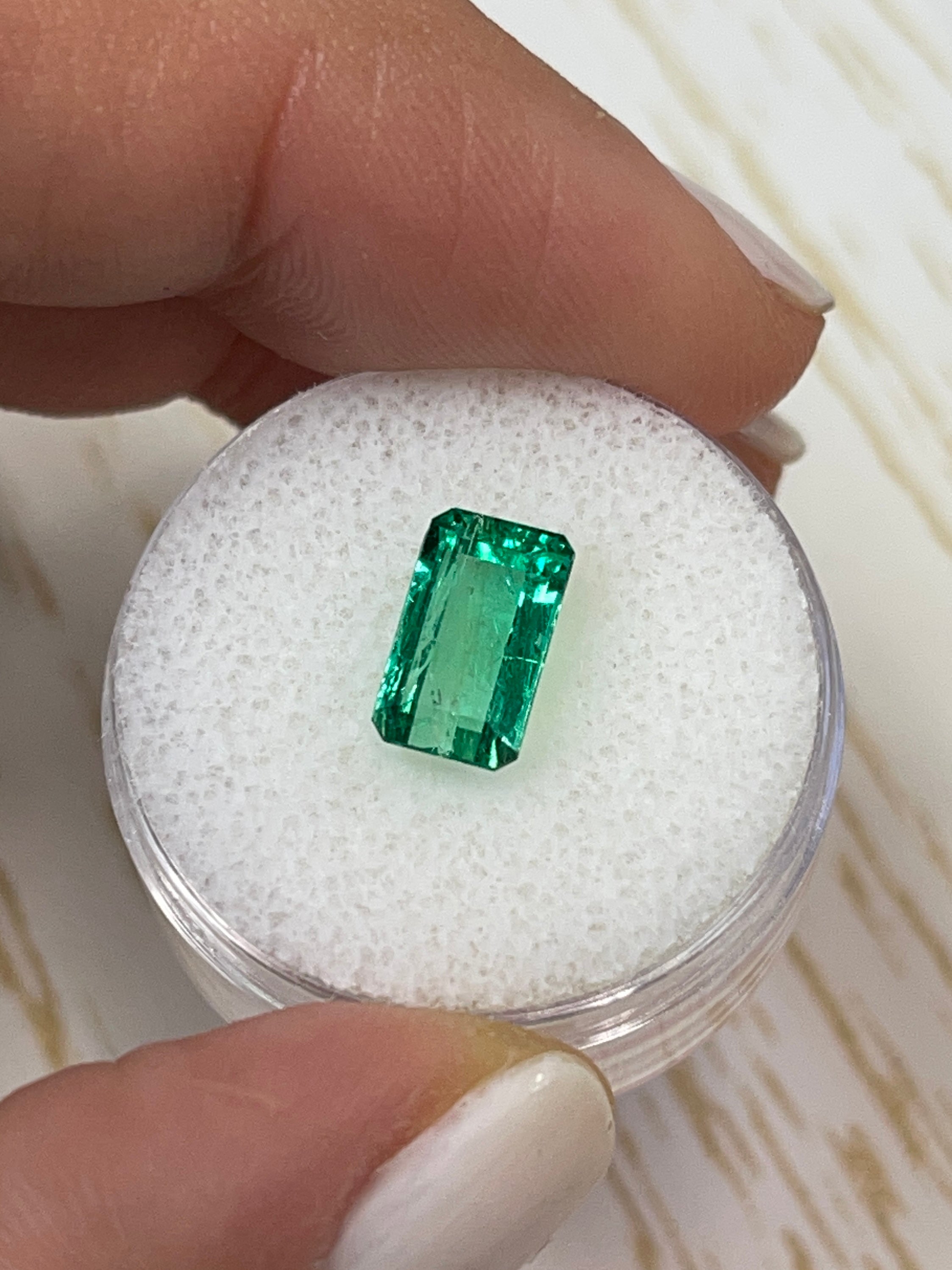 2.38-carat slender Muzo green Colombian emerald in emerald cut, loose gemstone from JR Colombian Emeralds.