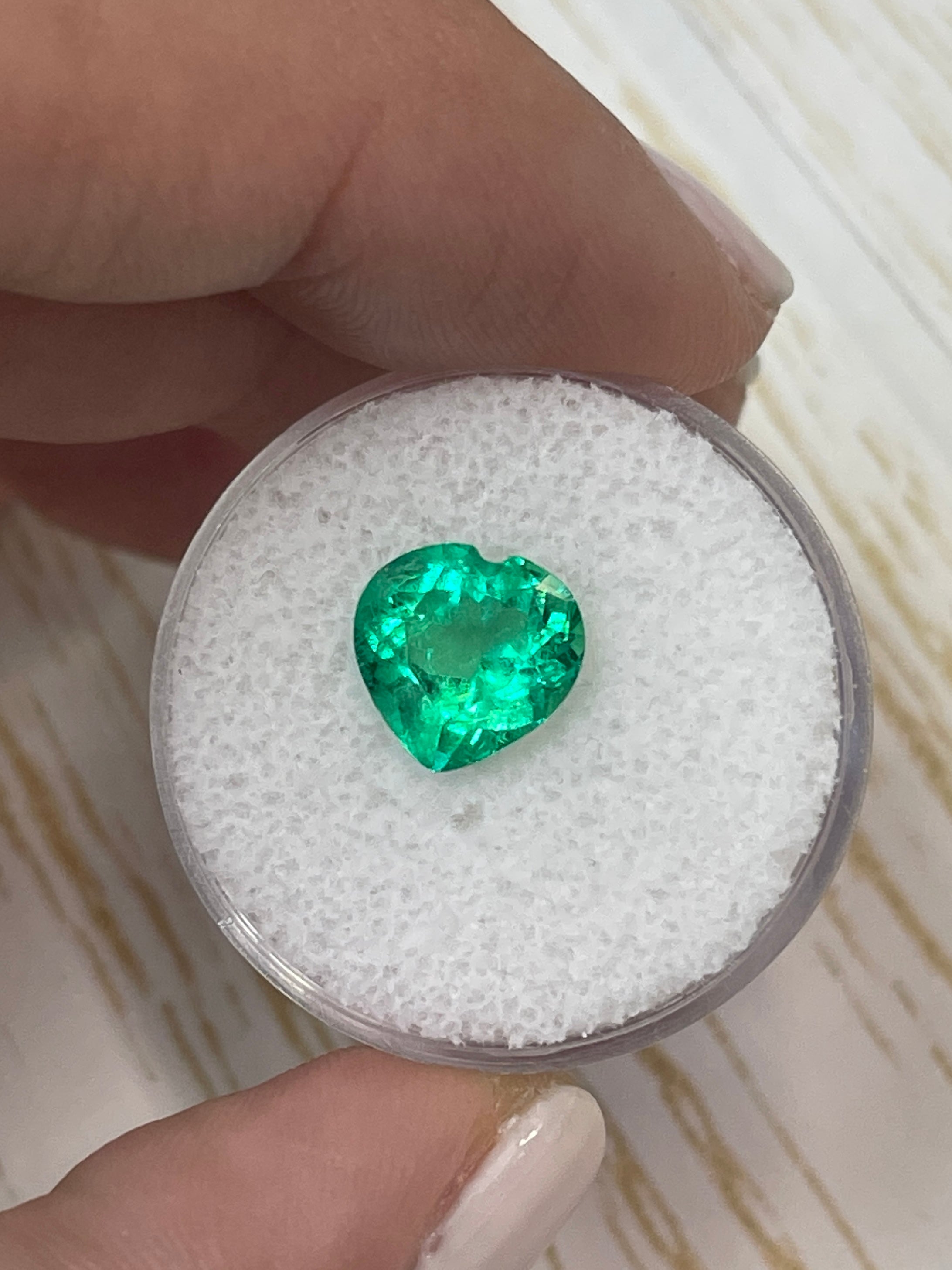 9x9mm yellowish green natural Colombian emerald in heart cut, 2.45 carats, loose gemstone from JR Colombian Emeralds.