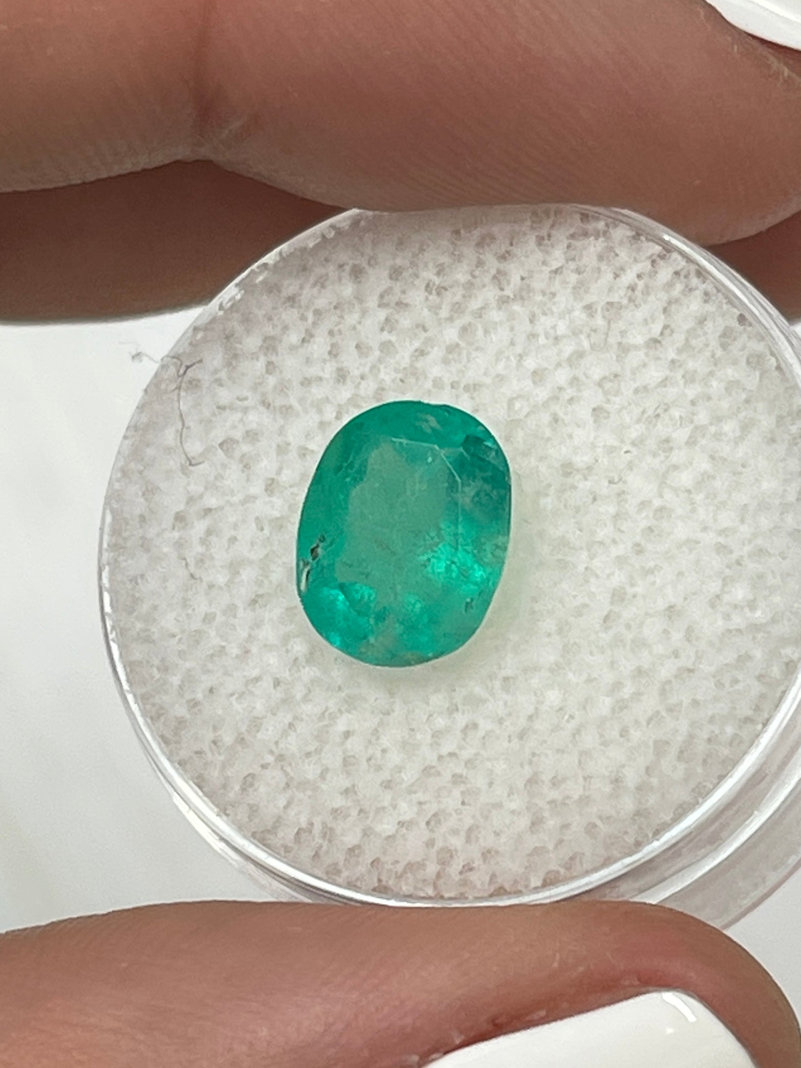 2.48 carat medium green oval Colombian emerald loose gemstone with natural clarity, cut by JR Colombian Emeralds.