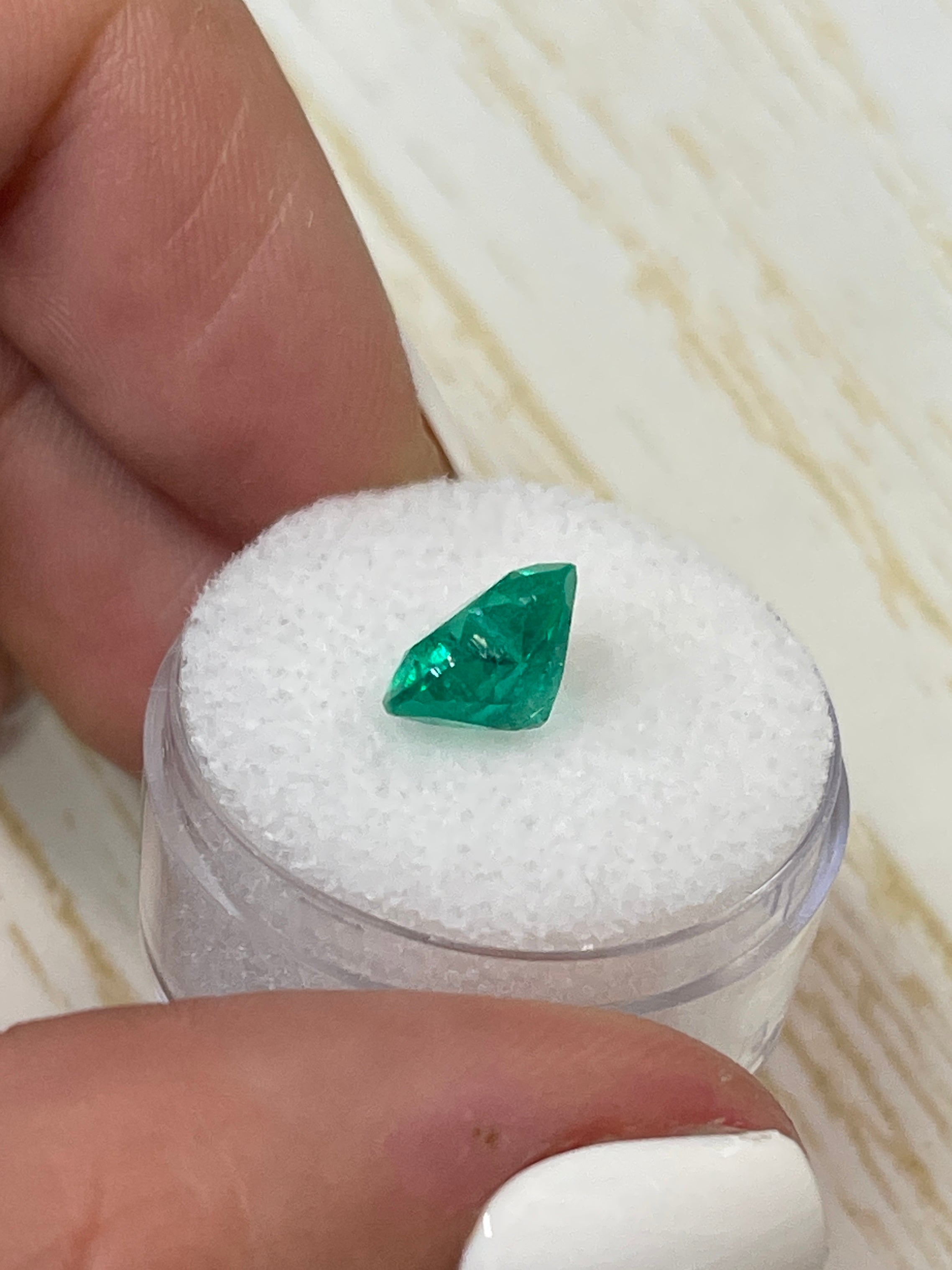 2.52 carat bluish green natural loose Colombian emerald heart cut, showcasing vibrant color and clarity, by JR Colombian Emeralds