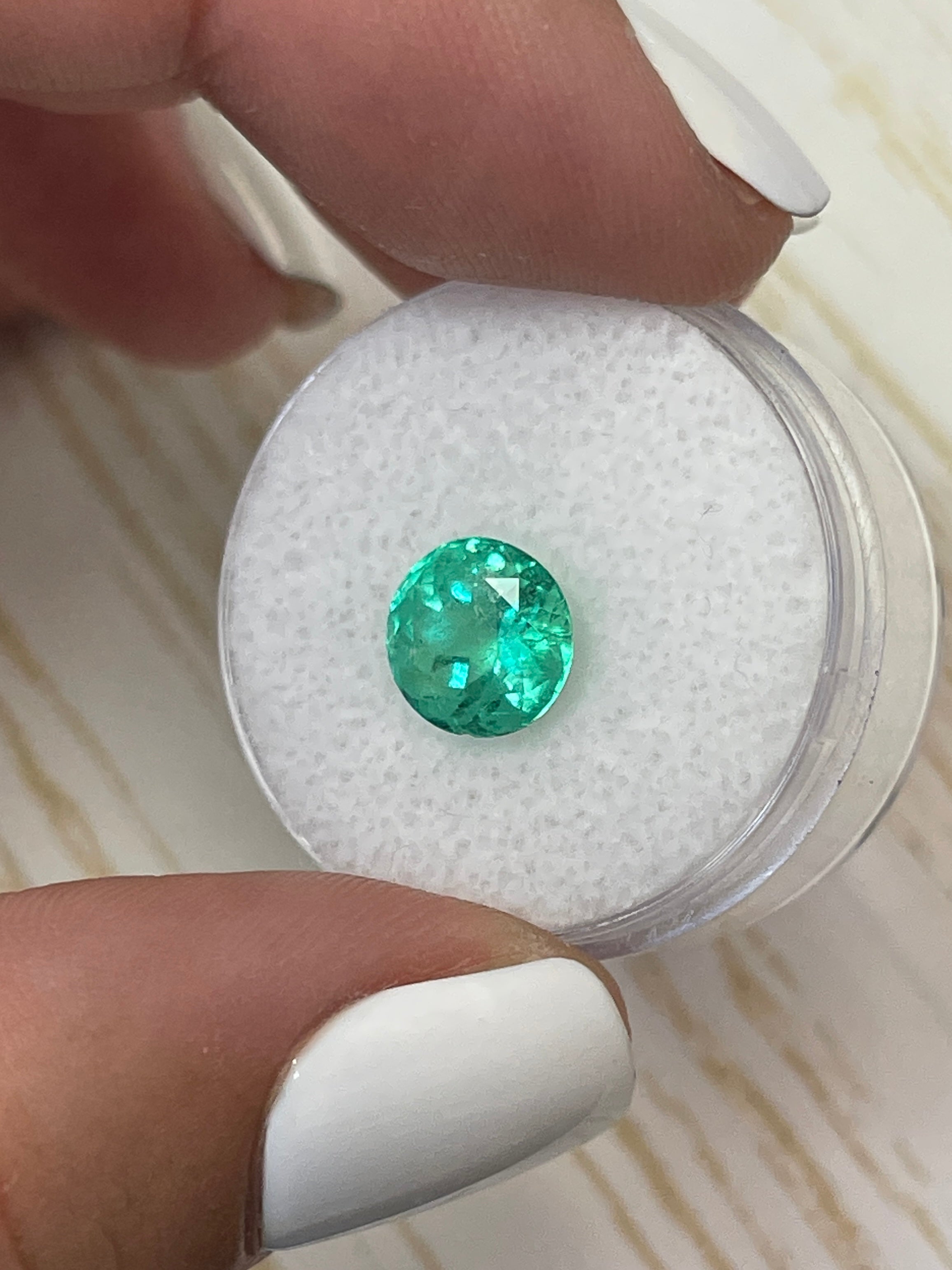 2.56 carat medium green natural round Colombian emerald gemstone, loose and uncut, from JR Colombian Emeralds.