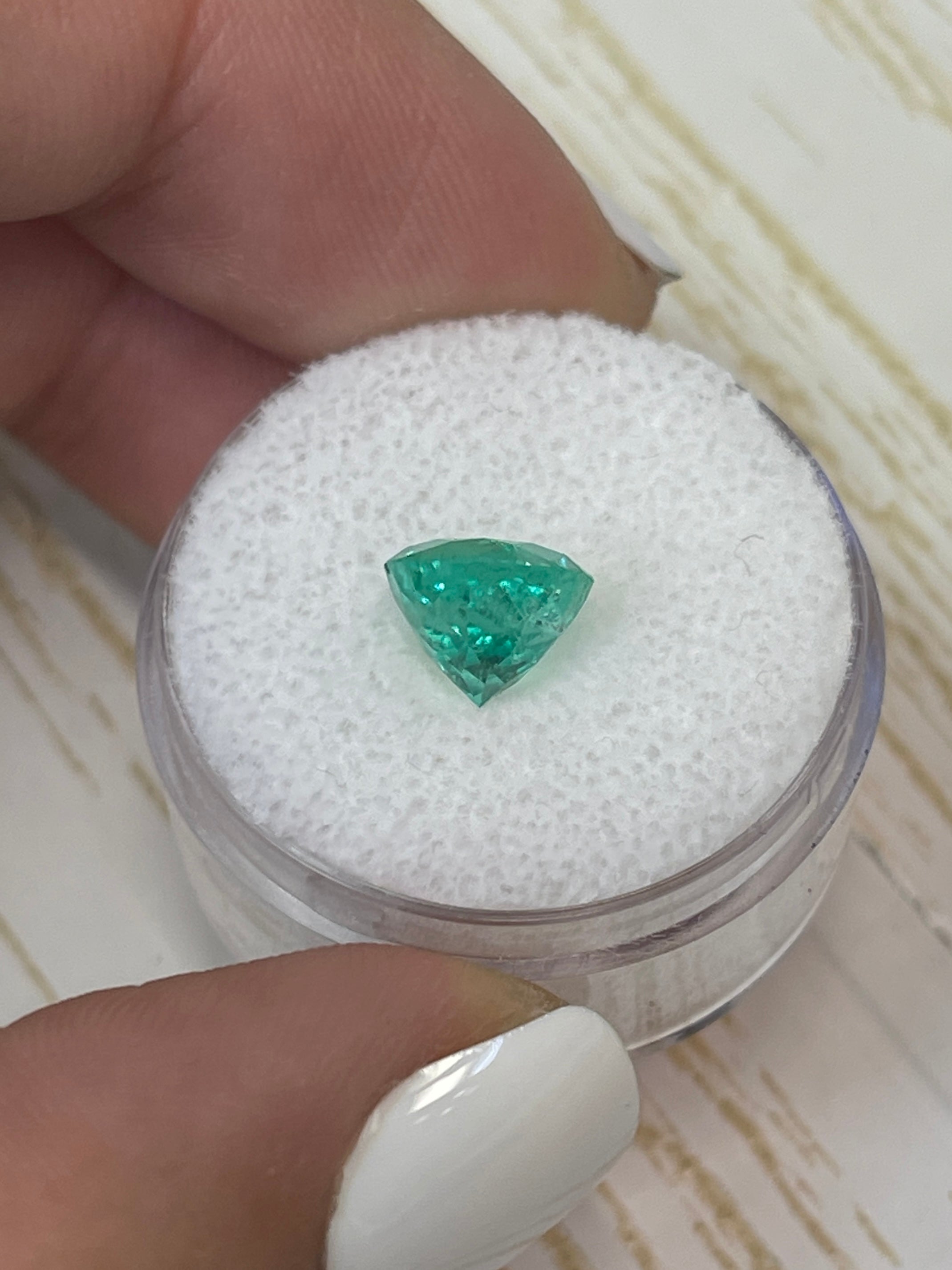 2.56-carat round green Colombian emerald loose gemstone with medium hue, natural and uncut, from JR Colombian Emeralds.