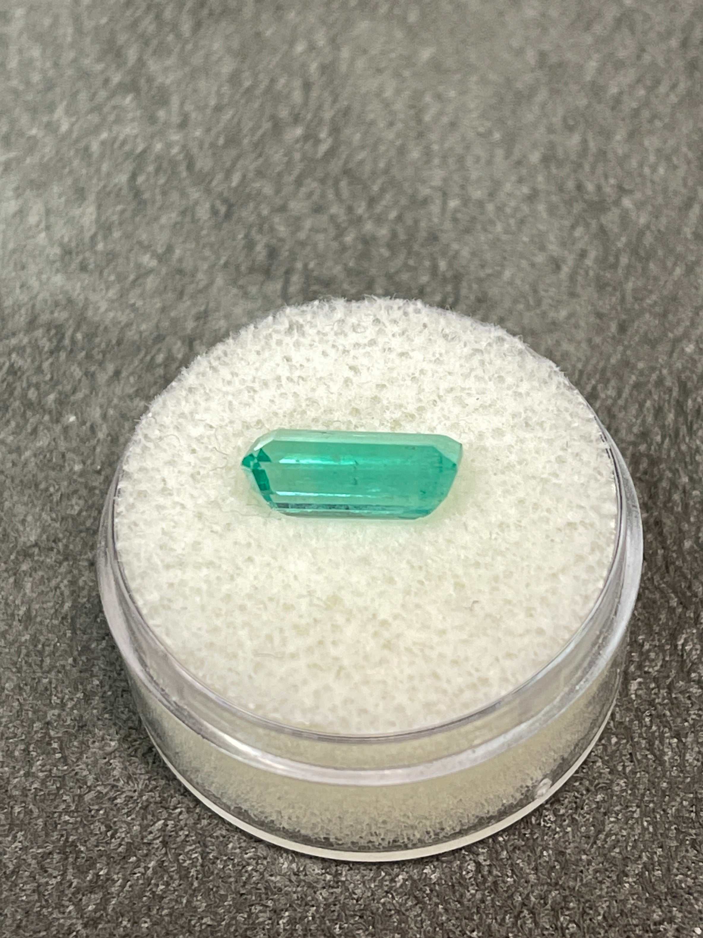 2.57 carat light bluish green natural Colombian emerald loose gemstone with elongated emerald cut, from JR Colombian Emeralds.
