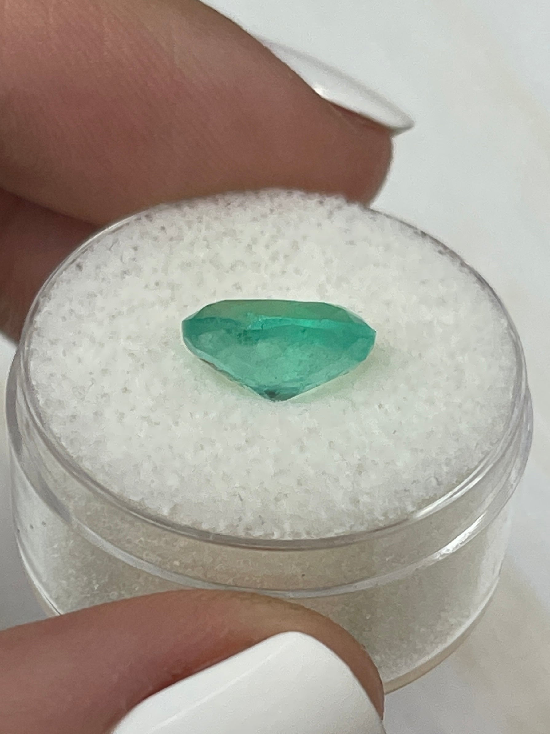 2.63 Carat light bluish green Colombian emerald loose oval cut gemstone from JR Colombian Emeralds.