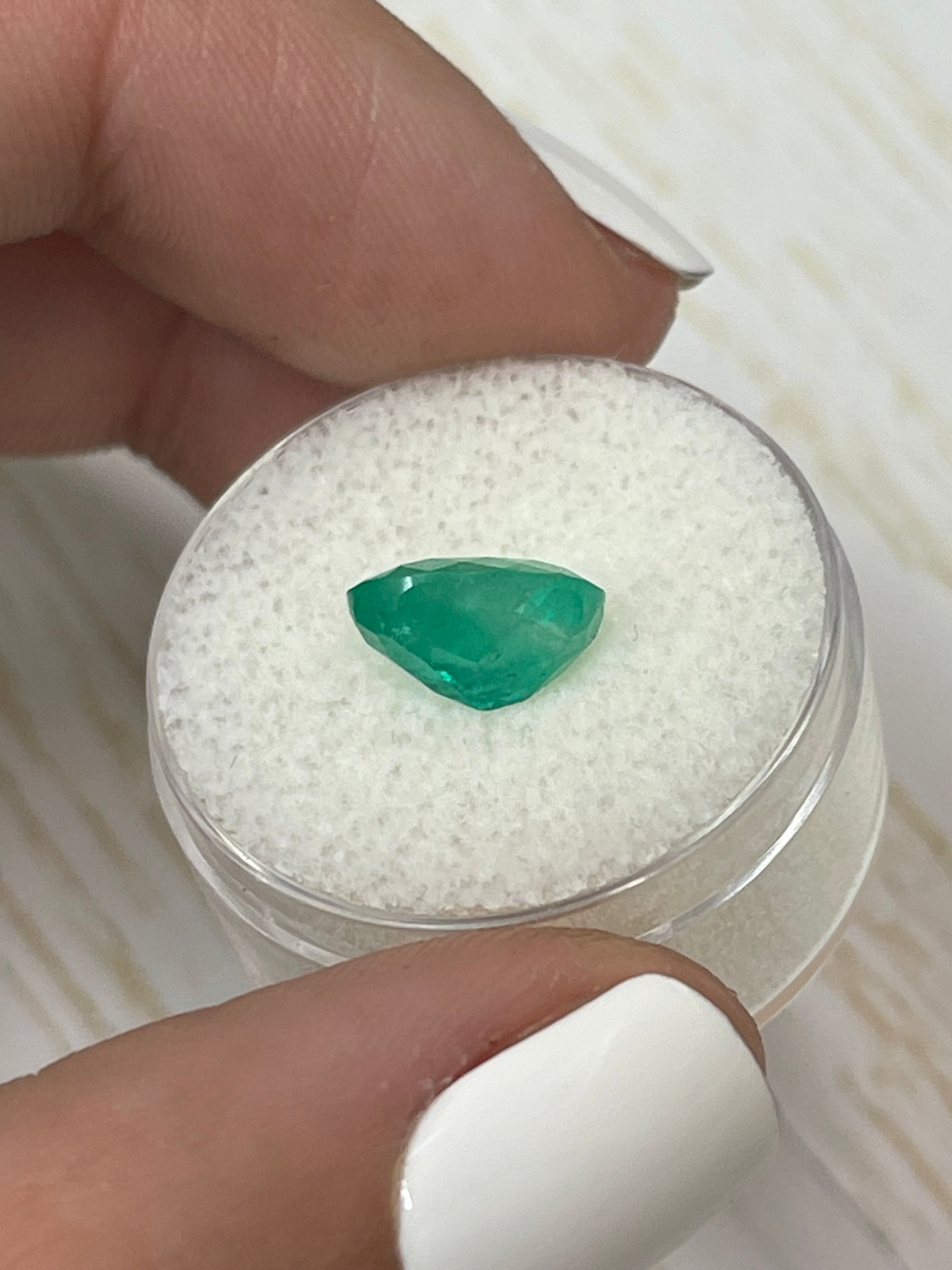 2.69 carat green natural Colombian emerald loose oval cut gemstone from JR Colombian Emeralds, showcasing vibrant color and clarity.