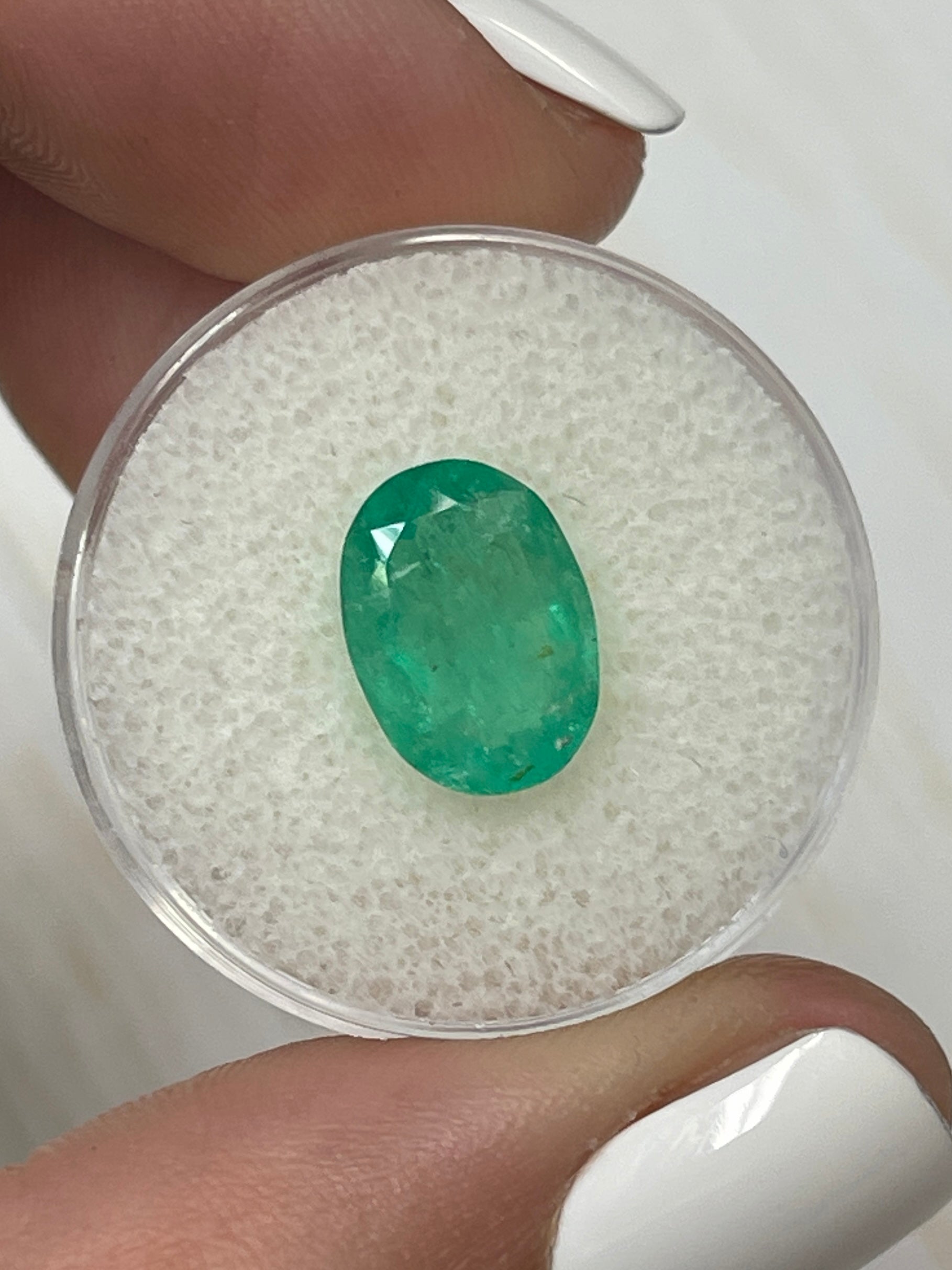 2.72 carat earthy green natural Colombian emerald loose oval cut gemstone from JR Colombian Emeralds.