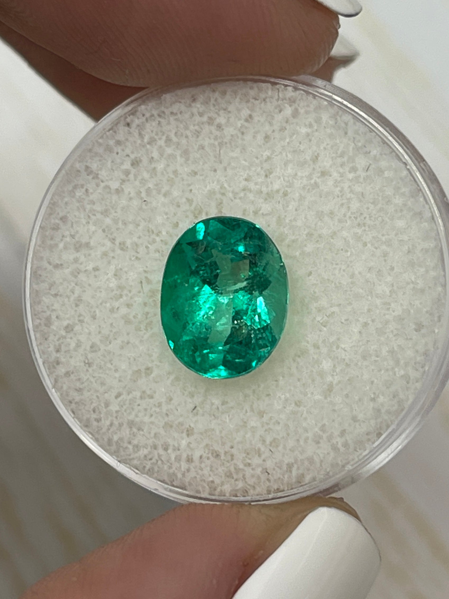 Vivid bluish green 2.80 carat oval cut Colombian emerald loose gemstone by JR Colombian Emeralds.