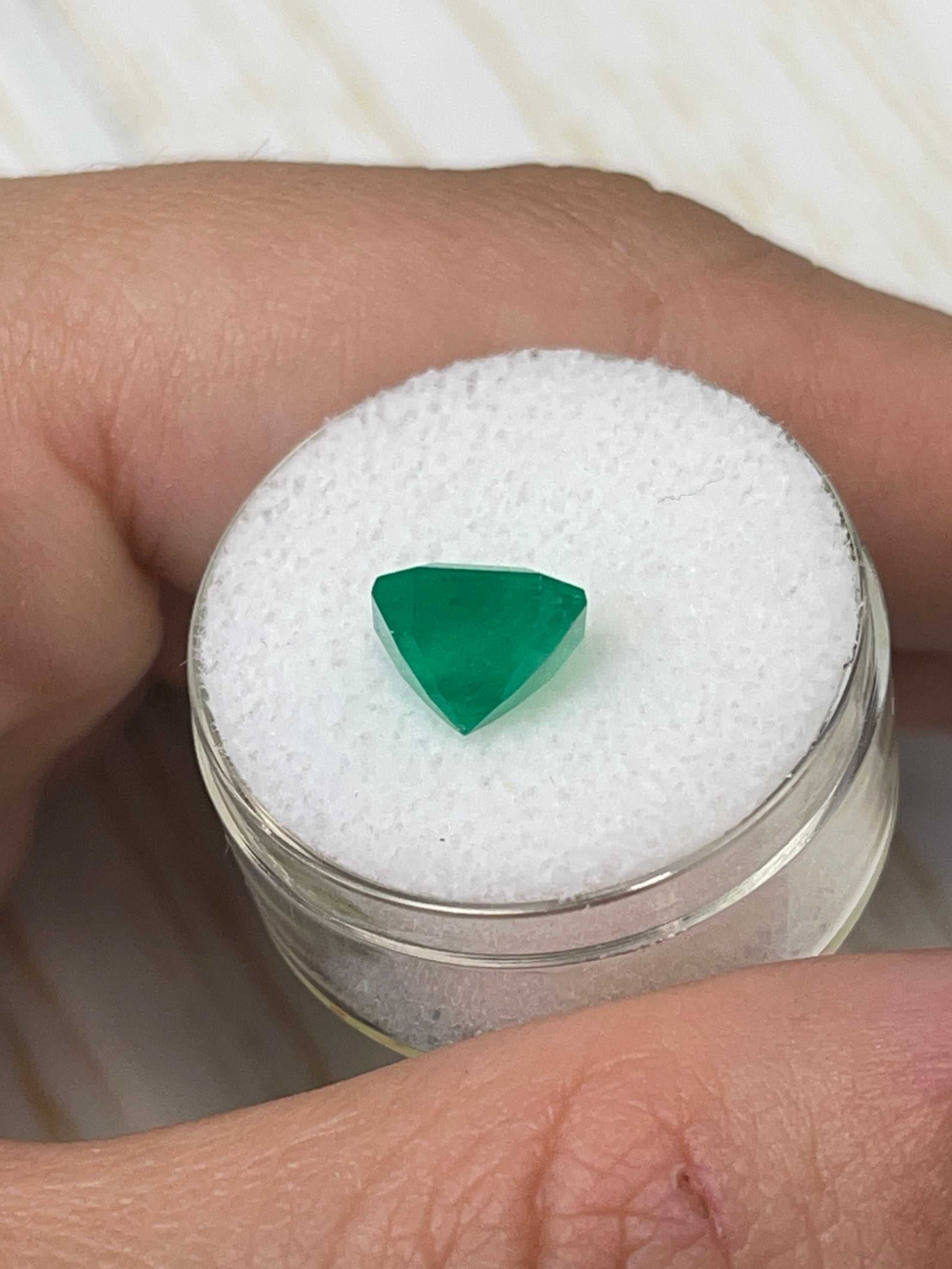 Vibrant 2.82 carat natural Colombian emerald loose gemstone in an Asscher cut, showcasing rich green color and clarity.