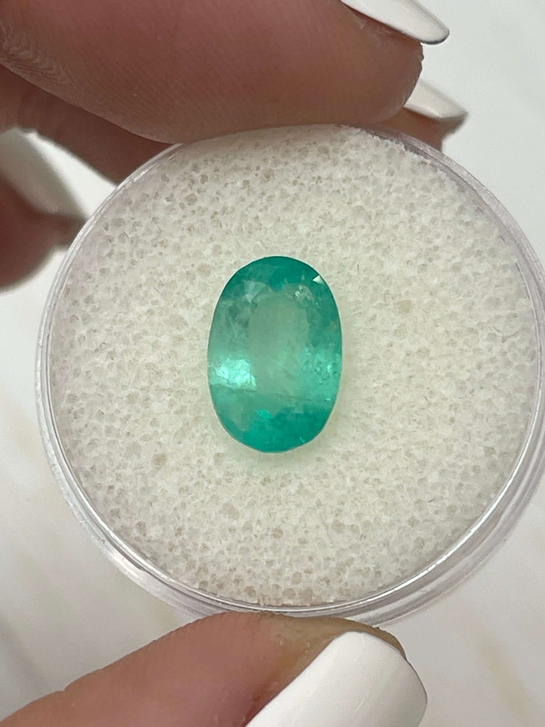 2.83 carat oval-cut pastel mint green natural Colombian emerald loose gemstone by JR Colombian Emeralds.