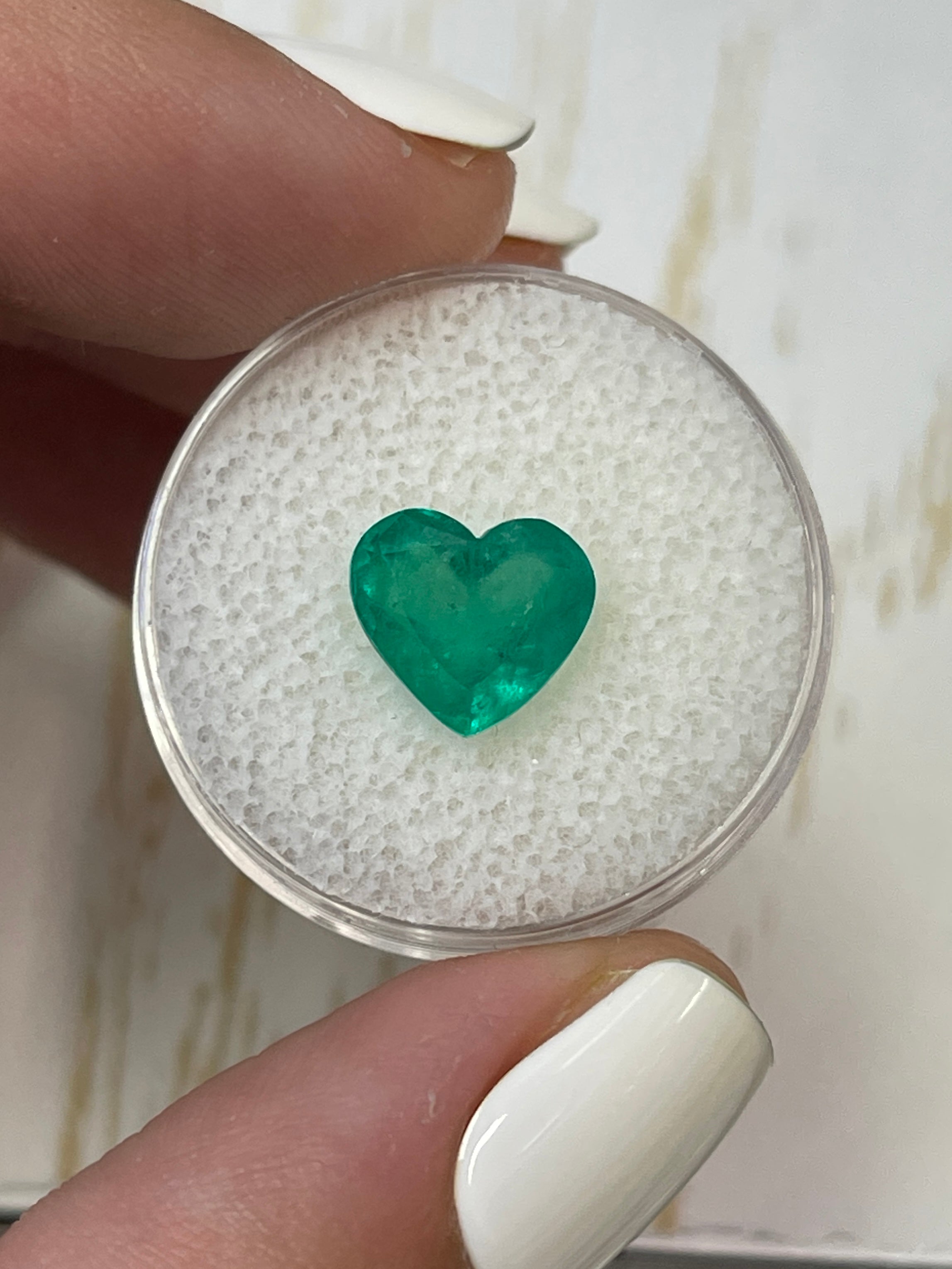 Bright green 2.87 carat natural Colombian emerald loose heart cut gemstone by JR Colombian Emeralds.