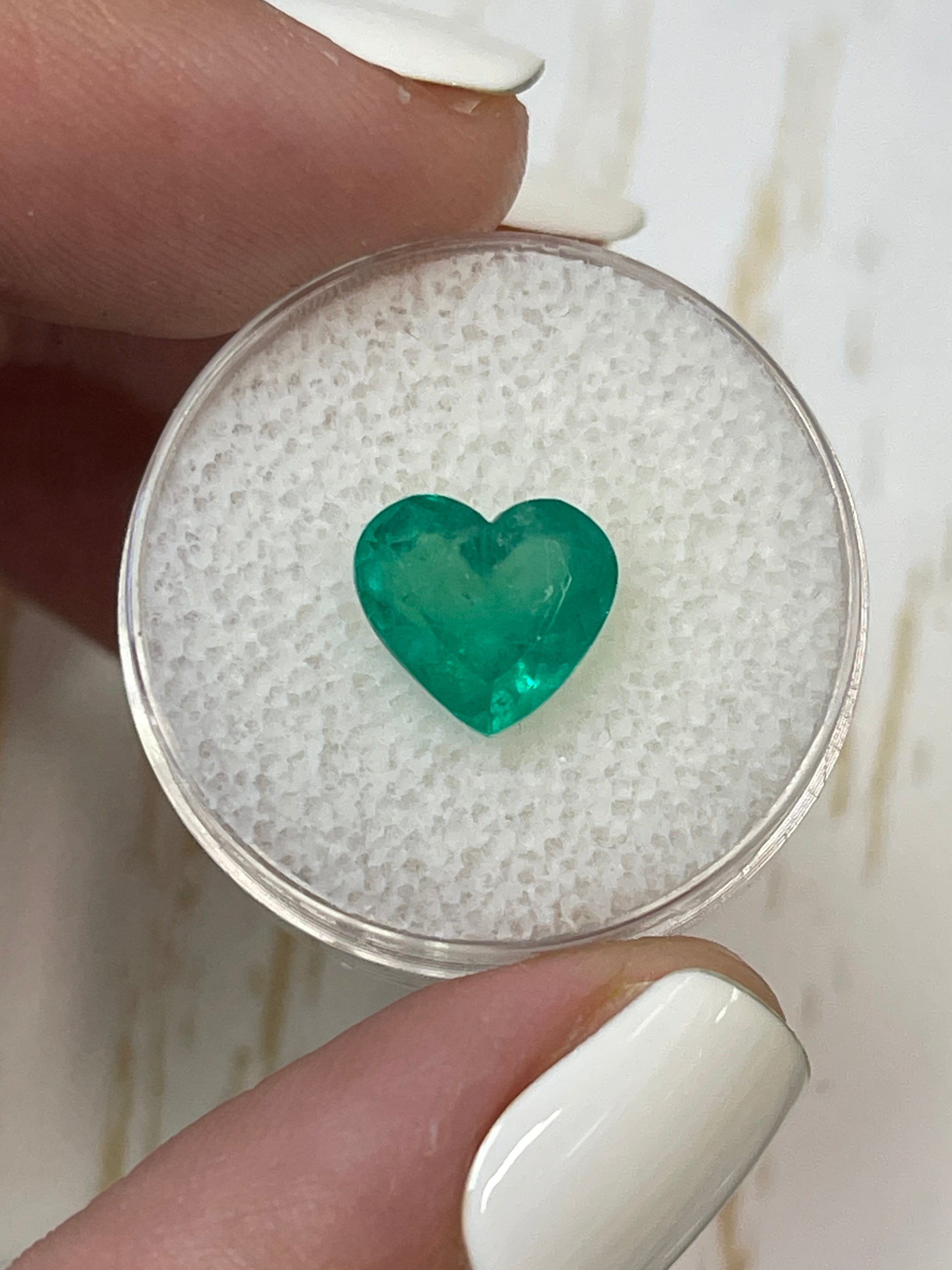 Bright green 2.87 carat natural Colombian emerald in heart cut, loose gemstone from JR Colombian Emeralds.