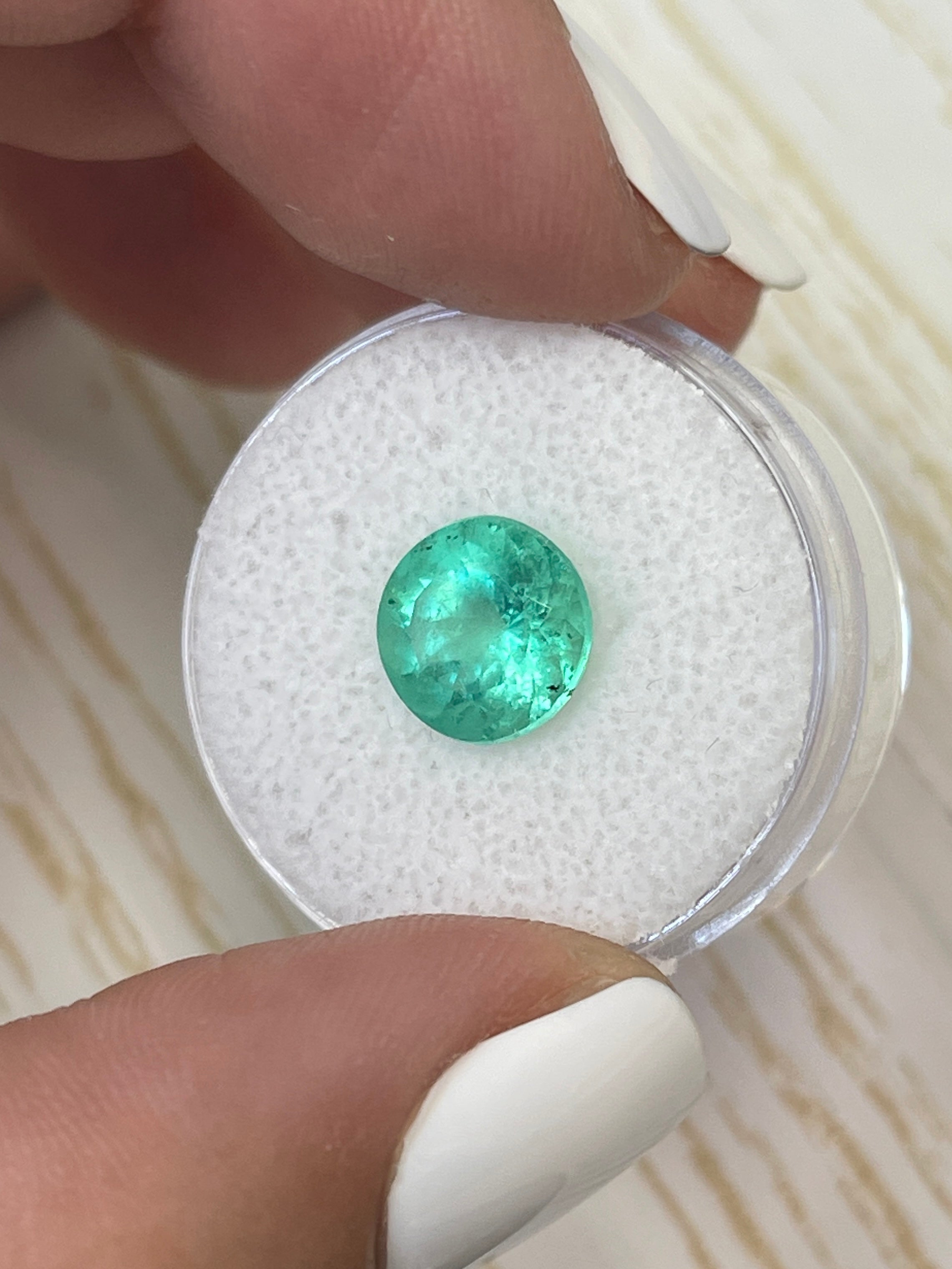 Natural round 2.87 carat medium green Colombian emerald loose gemstone from JR Colombian Emeralds.