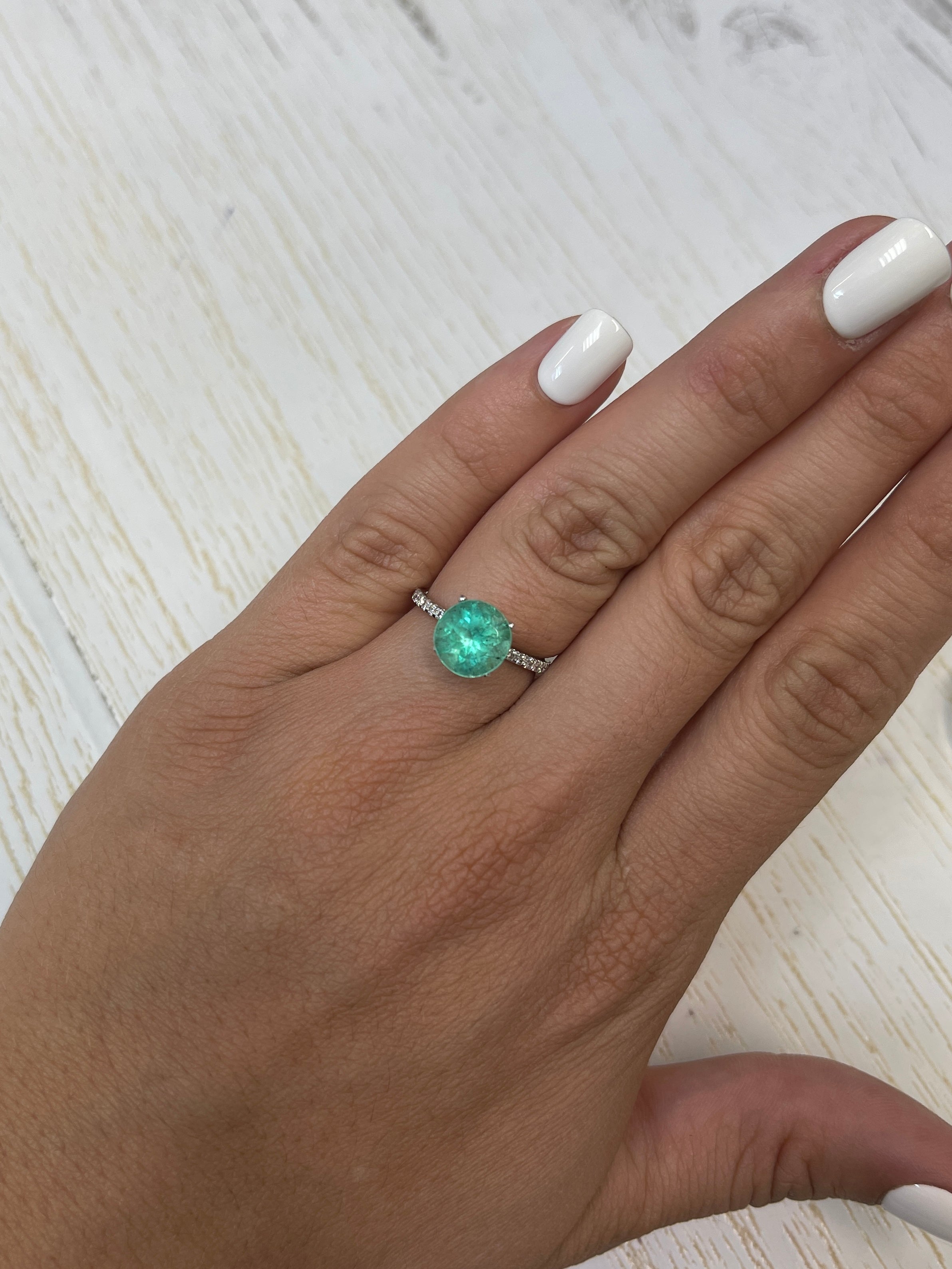 Round 2.87 carat medium green Colombian emerald loose gemstone with natural clarity and vibrant color.
