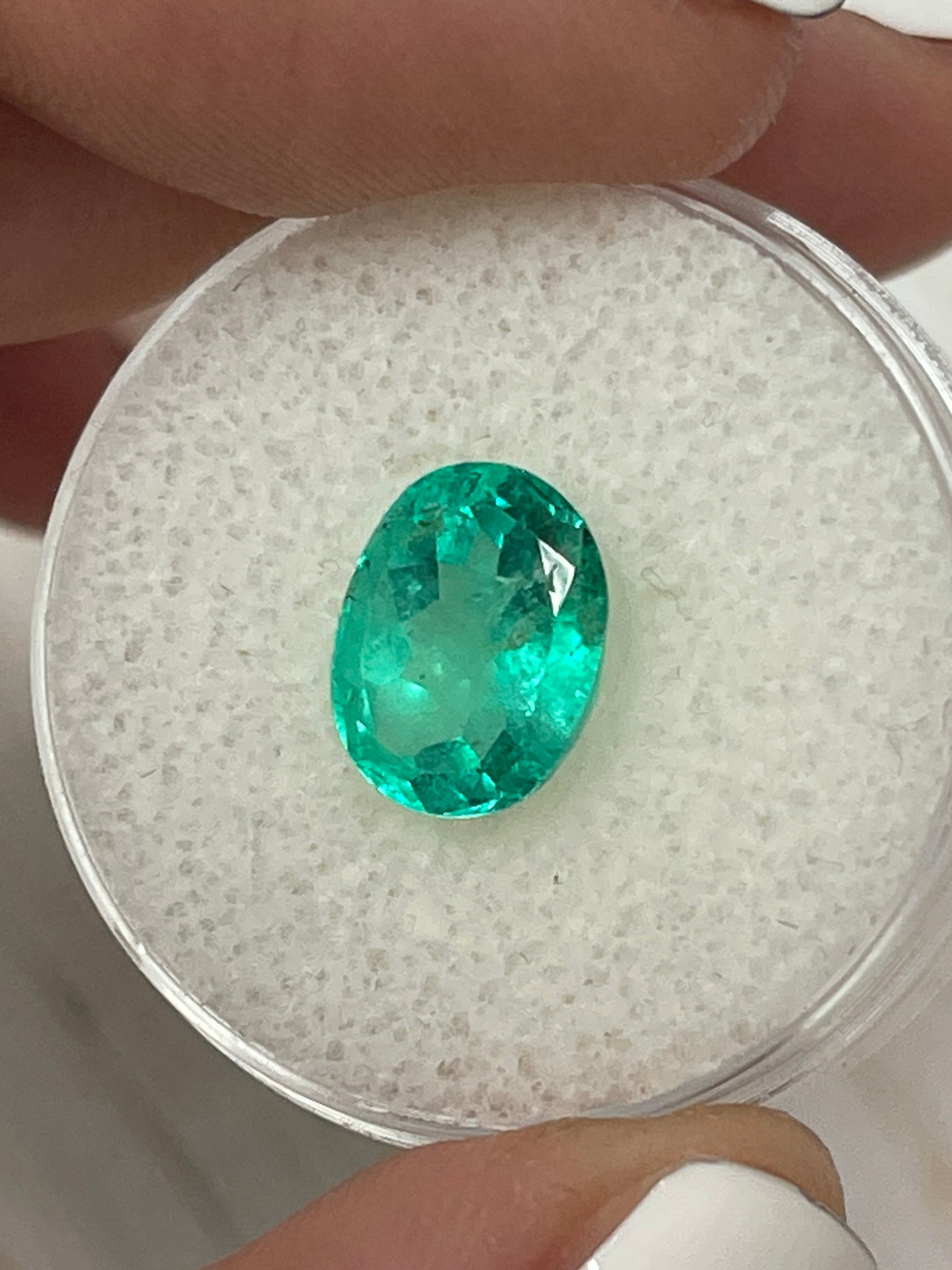 2.90 carat bluish green oval cut Colombian emerald loose gemstone from JR Colombian Emeralds, natural and vibrant.