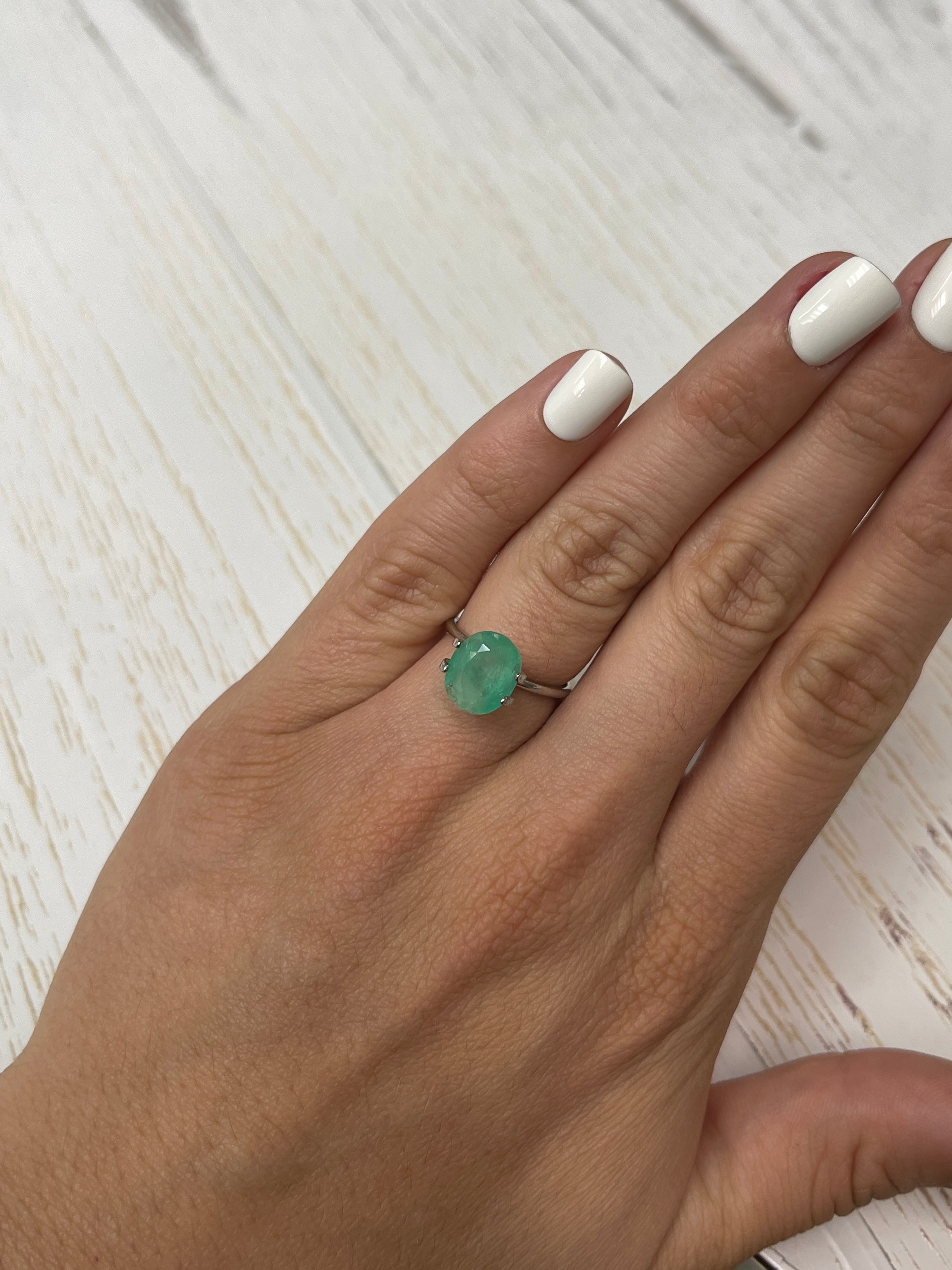 2.95 Carat pastel mint green Colombian emerald loose oval cut gemstone from JR Colombian Emeralds, natural and vibrant in appearance.