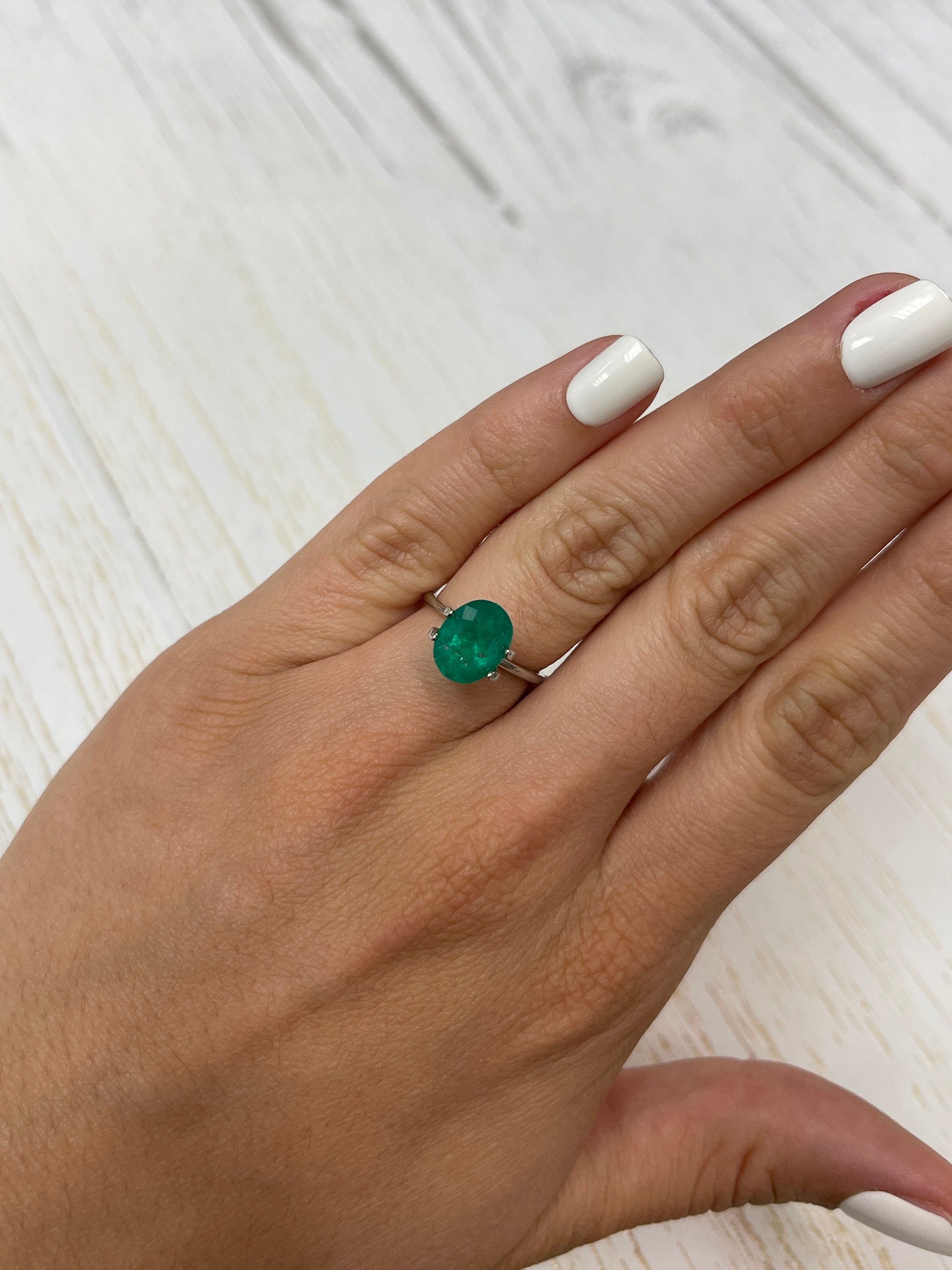 2.98 carat intense dark green Colombian emerald loose oval cut gemstone from JR Colombian Emeralds.