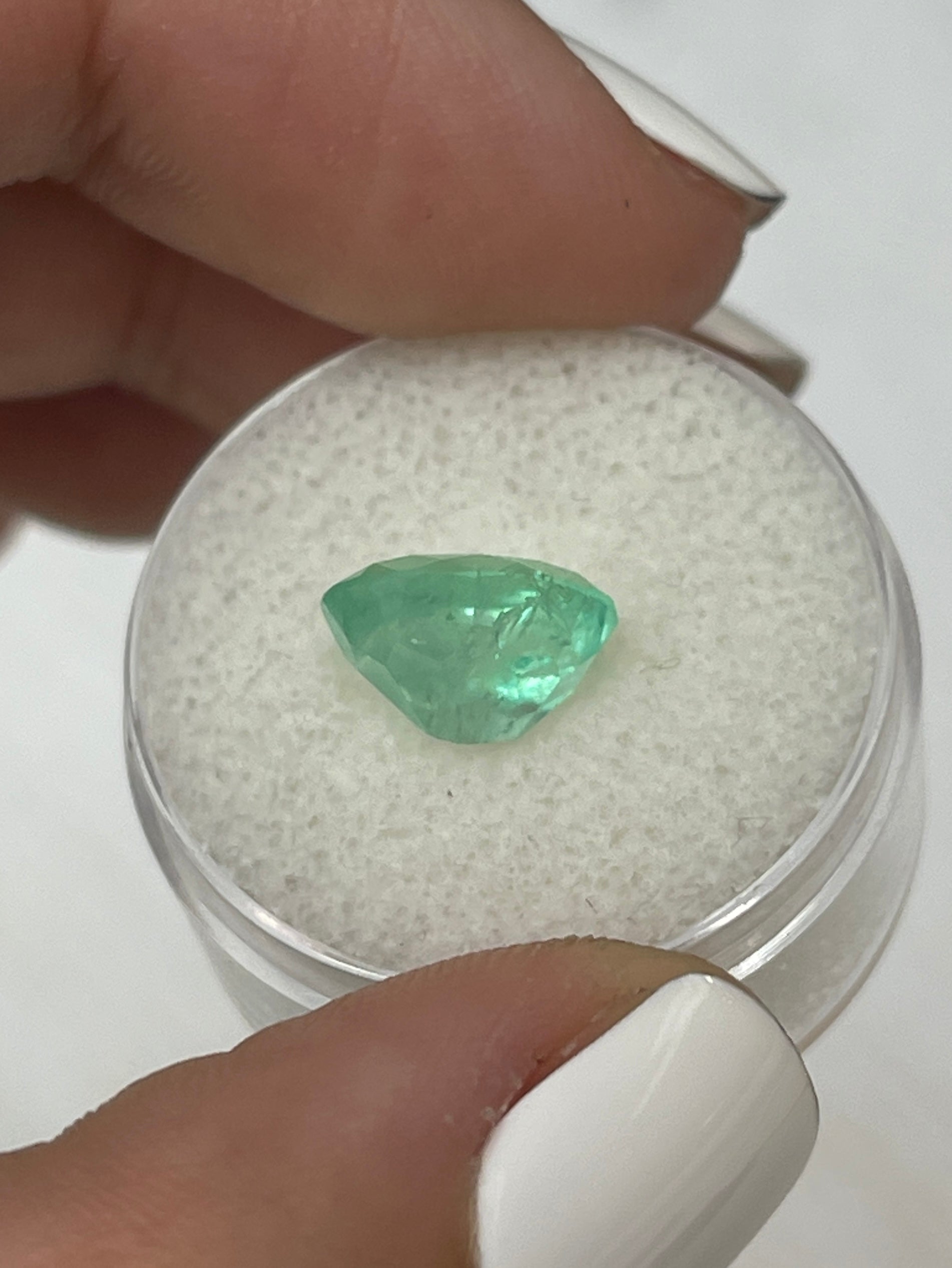 3.09 Carat pastel light green Colombian emerald loose oval cut gemstone from JR Colombian Emeralds.