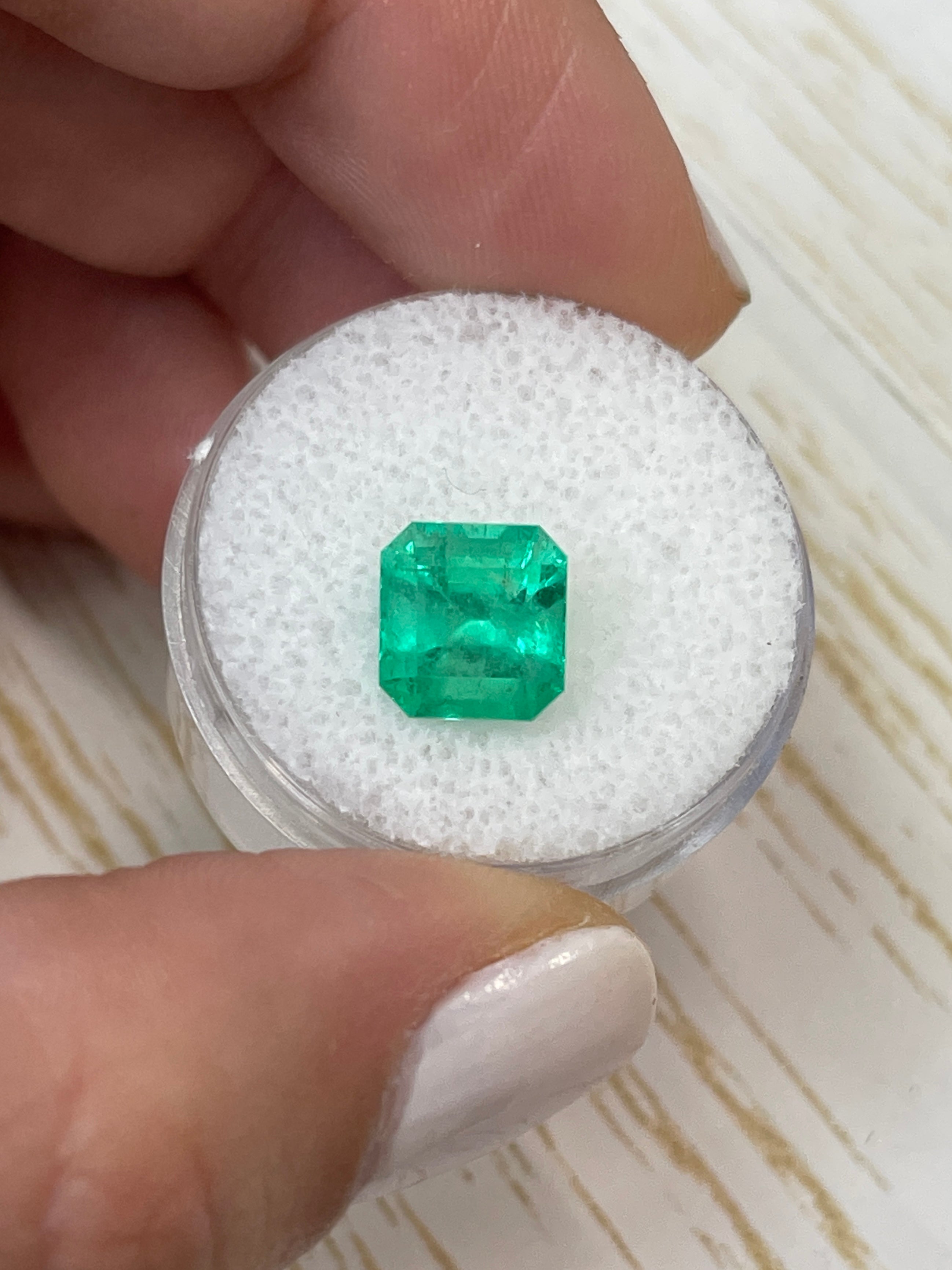 3.28 Carat spring green Colombian emerald loose Asscher cut gemstone with 8.6x8.2mm dimensions, natural and vibrant.