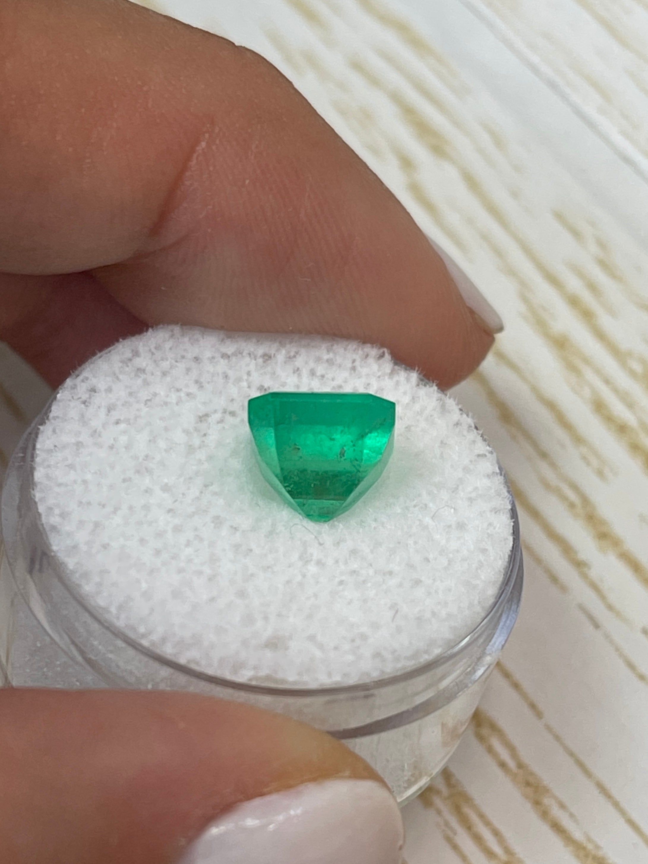 3.28 carat spring green Colombian emerald loose Asscher cut gemstone from JR Colombian Emeralds, showcasing its vibrant color and clarity.