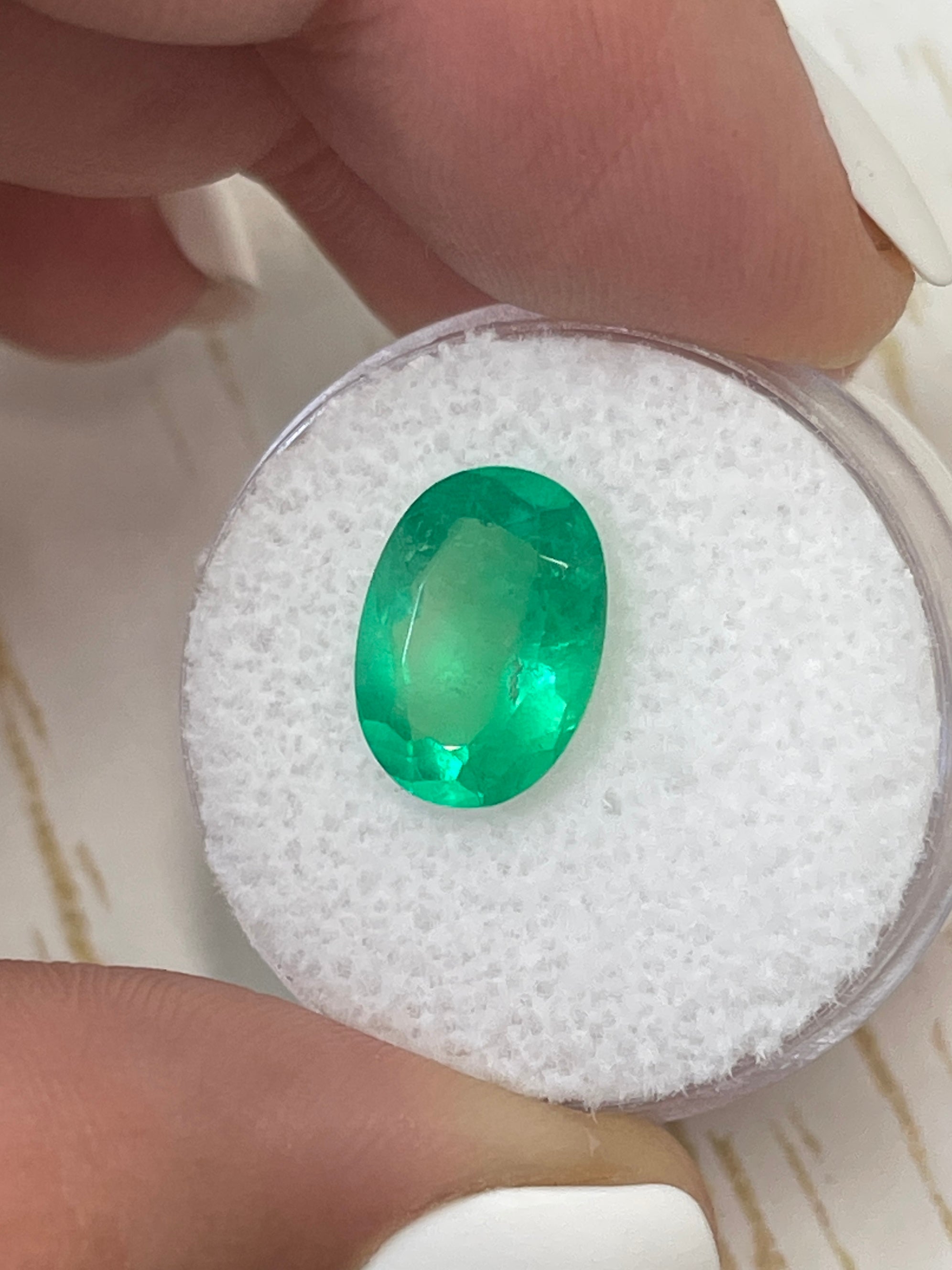 3.32 carat neon green natural Colombian emerald, oval cut, loose gemstone from JR Colombian Emeralds.
