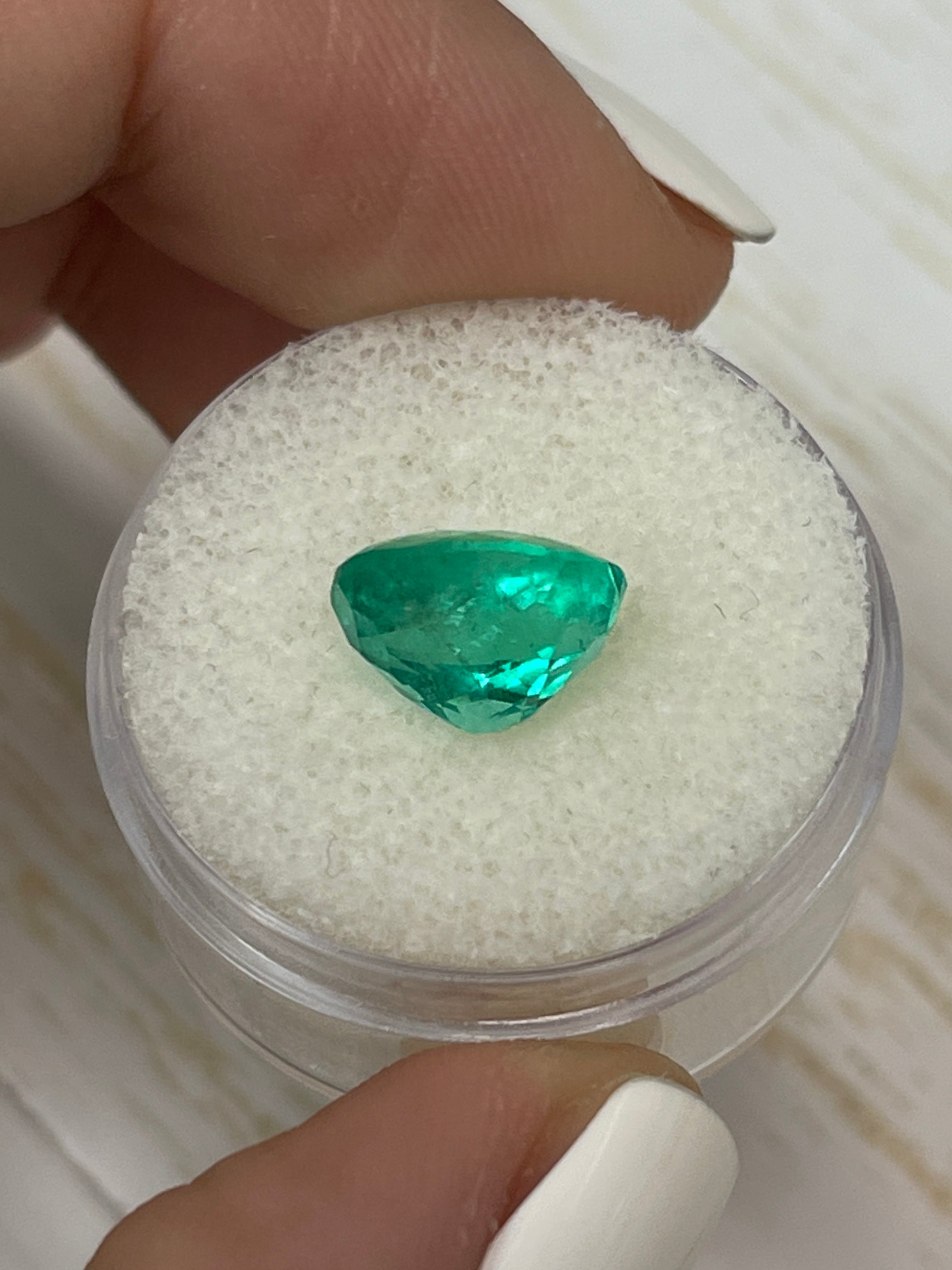 3.32 carat vivid green natural Colombian emerald loose oval cut gemstone by JR Colombian Emeralds.