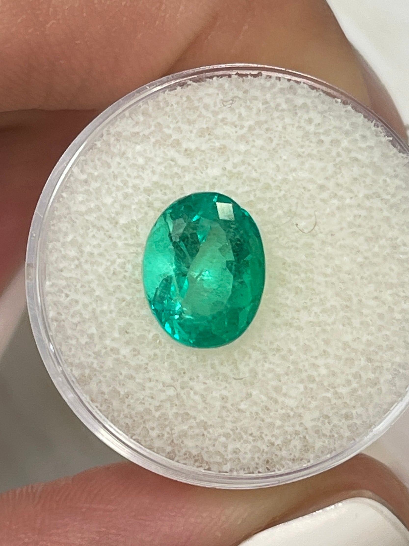 3.32 carat vivacious green natural Colombian emerald loose oval cut gemstone from JR Colombian Emeralds