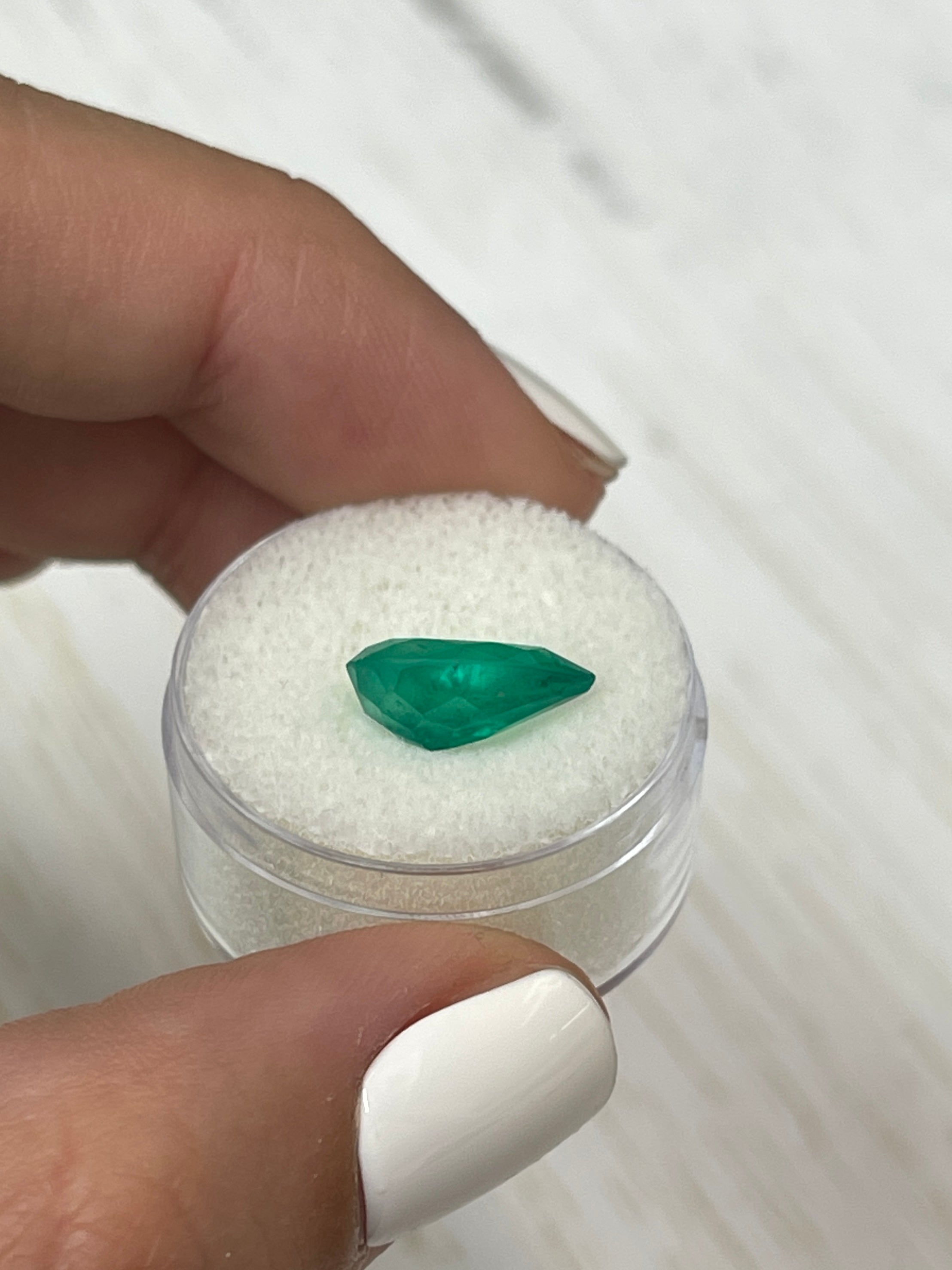 Natural 3.46 carat grass green Colombian emerald in pear cut, loose gemstone from JR Colombian Emeralds.