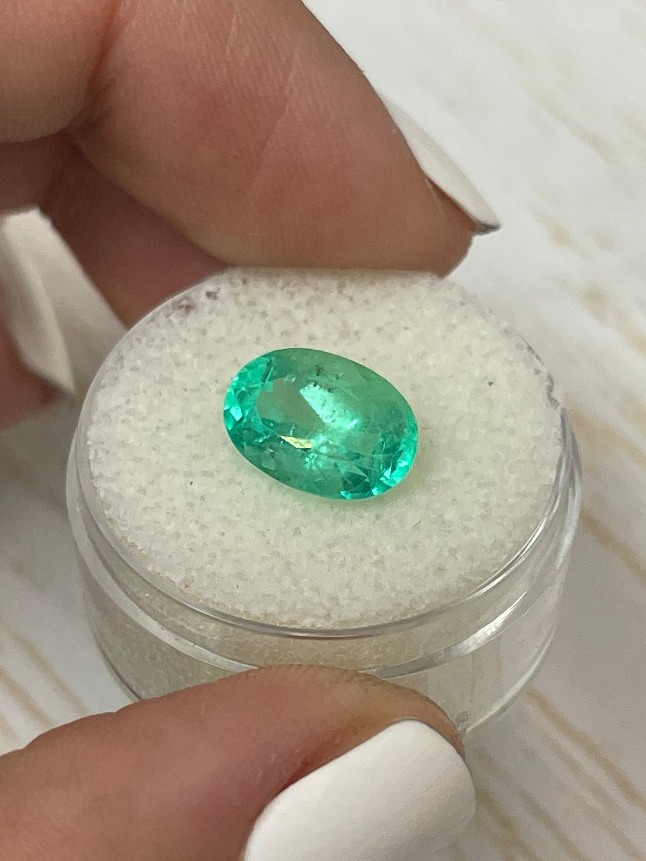 3.55 carat light bluish green Colombian emerald loose oval cut gemstone from JR Colombian Emeralds.