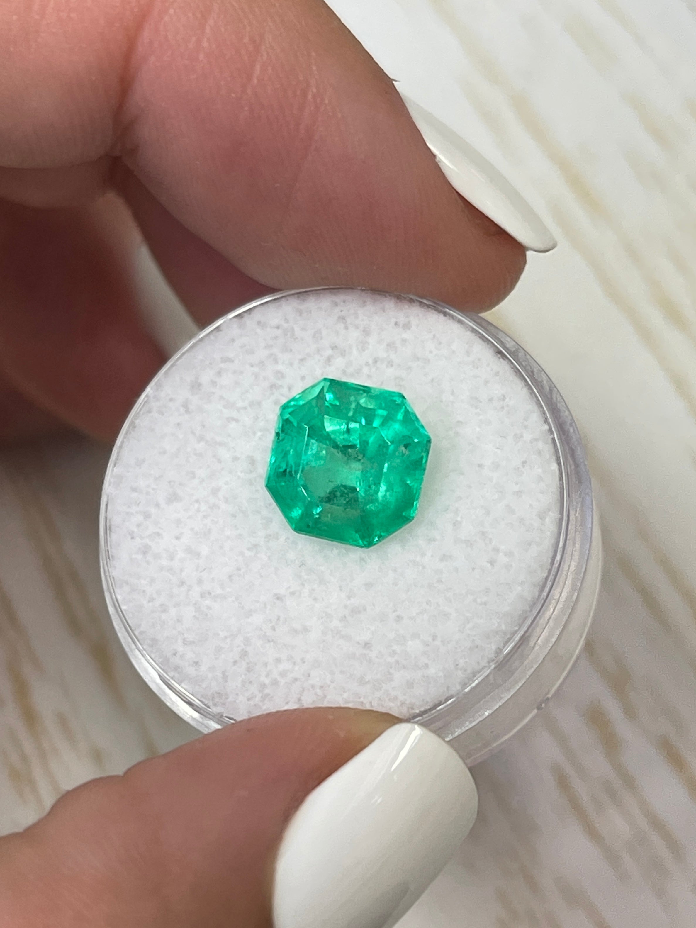 Luminous 3.68 Carat natural Colombian emerald loose Asscher cut with clipped corners, from JR Colombian Emeralds.