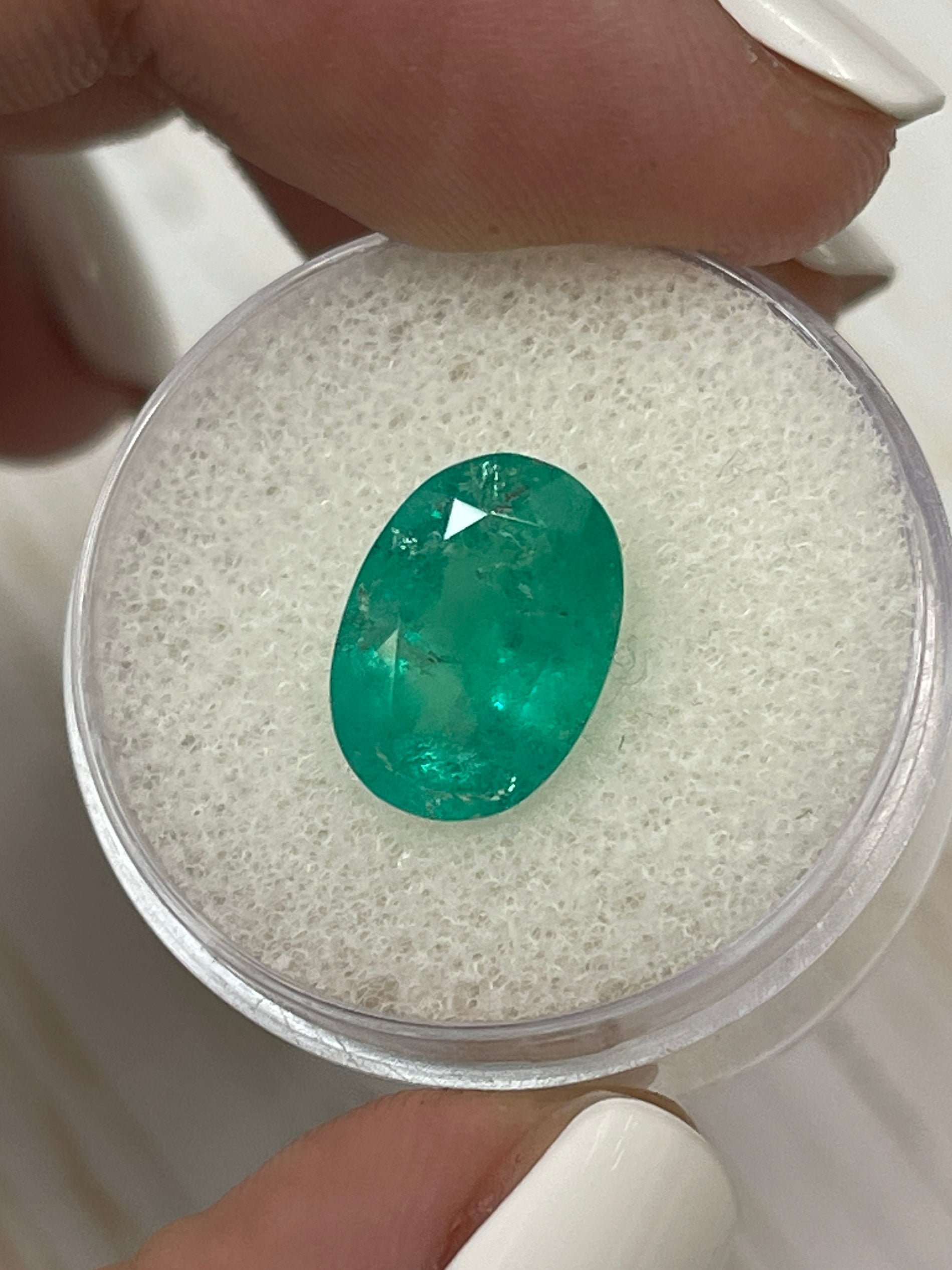 Natural 3.72 Carat Colombian Emerald loose oval cut gemstone with earthy green tones, from JR Colombian Emeralds.