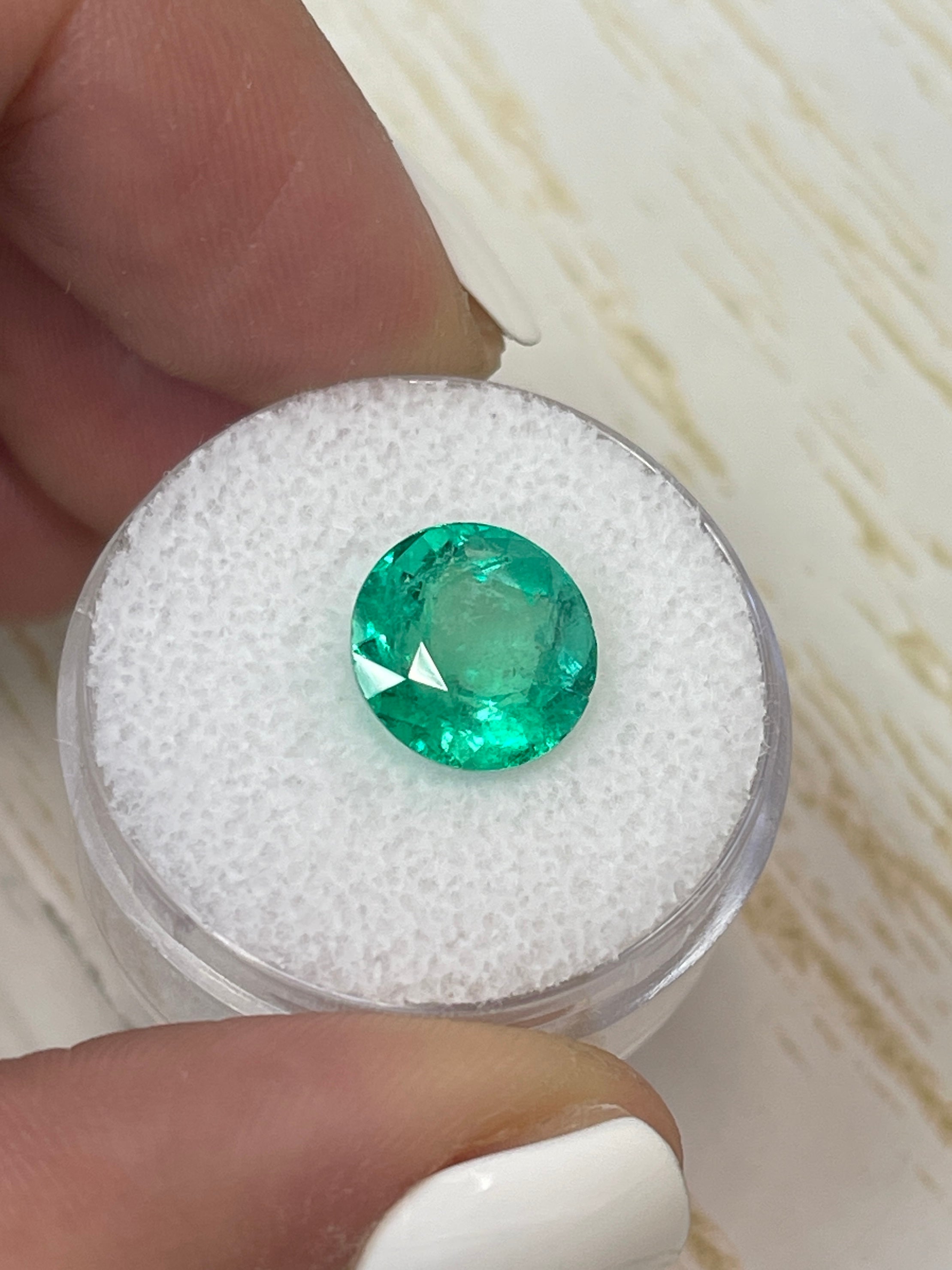 Vibrant green 3.79 carat round natural Colombian emerald loose gemstone from JR Colombian Emeralds.
