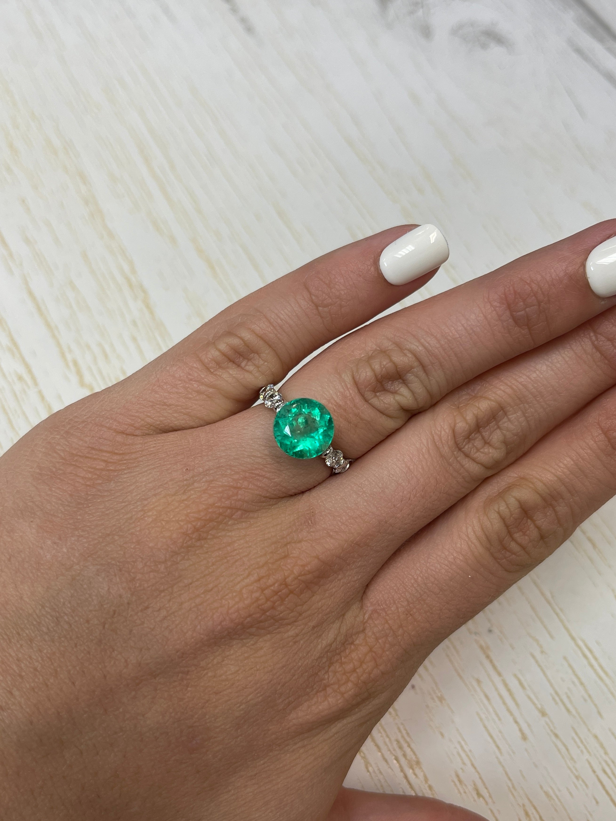 Vibrant green 3.79 carat natural round Colombian emerald gemstone, loose and unmounted, from JR Colombian Emeralds.