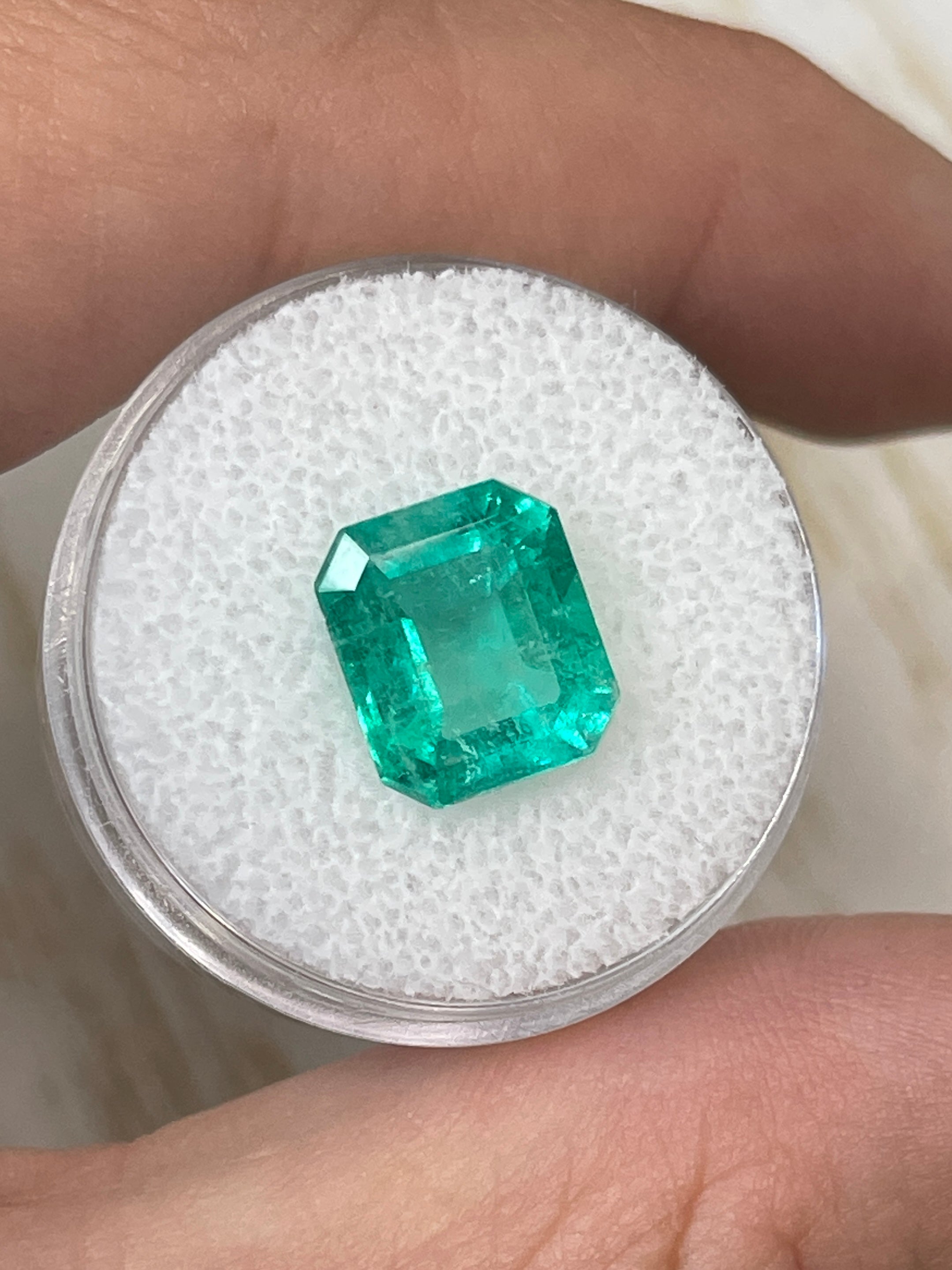 Bluish green 4.17 carat natural Colombian emerald loose gemstone in classic emerald cut, from JR Colombian Emeralds.