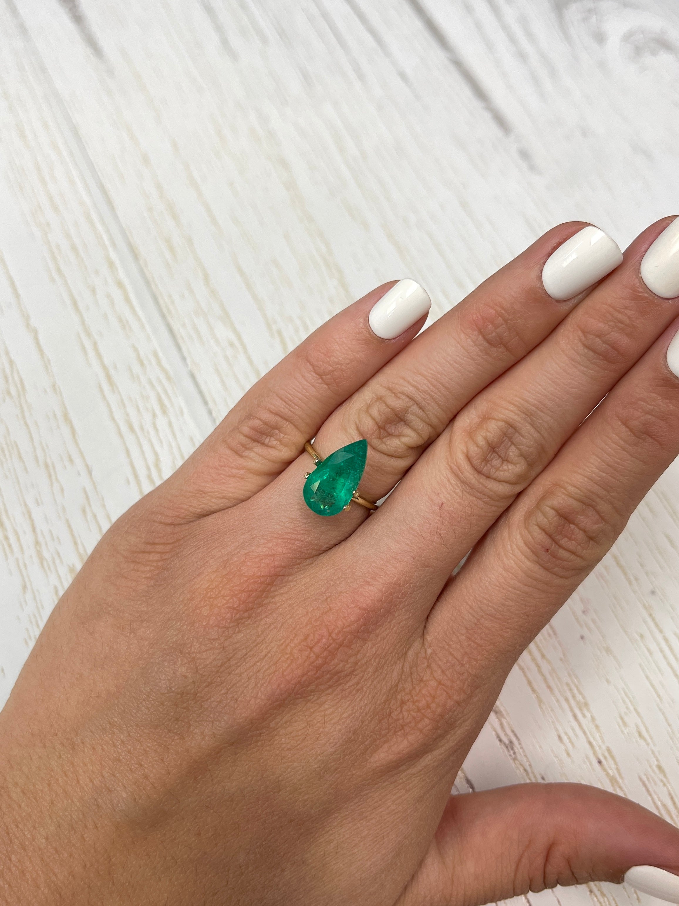 Natural 4.34 carat 16x9 Colombian emerald loose gemstone with a pear cut, rich green color from JR Colombian Emeralds