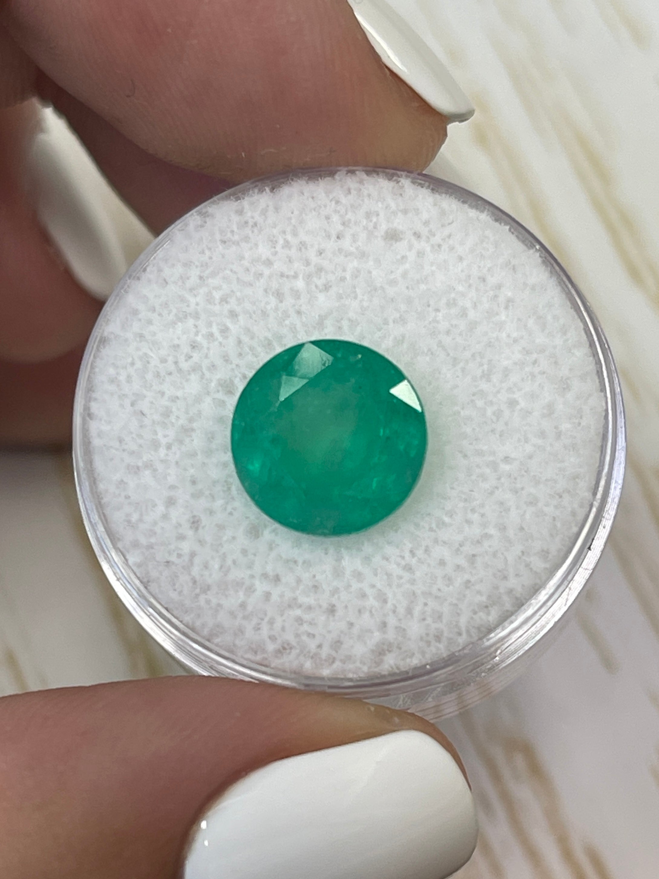 Medium green 4.42 carat round Colombian emerald gemstone, natural loose stone from JR Colombian Emeralds.