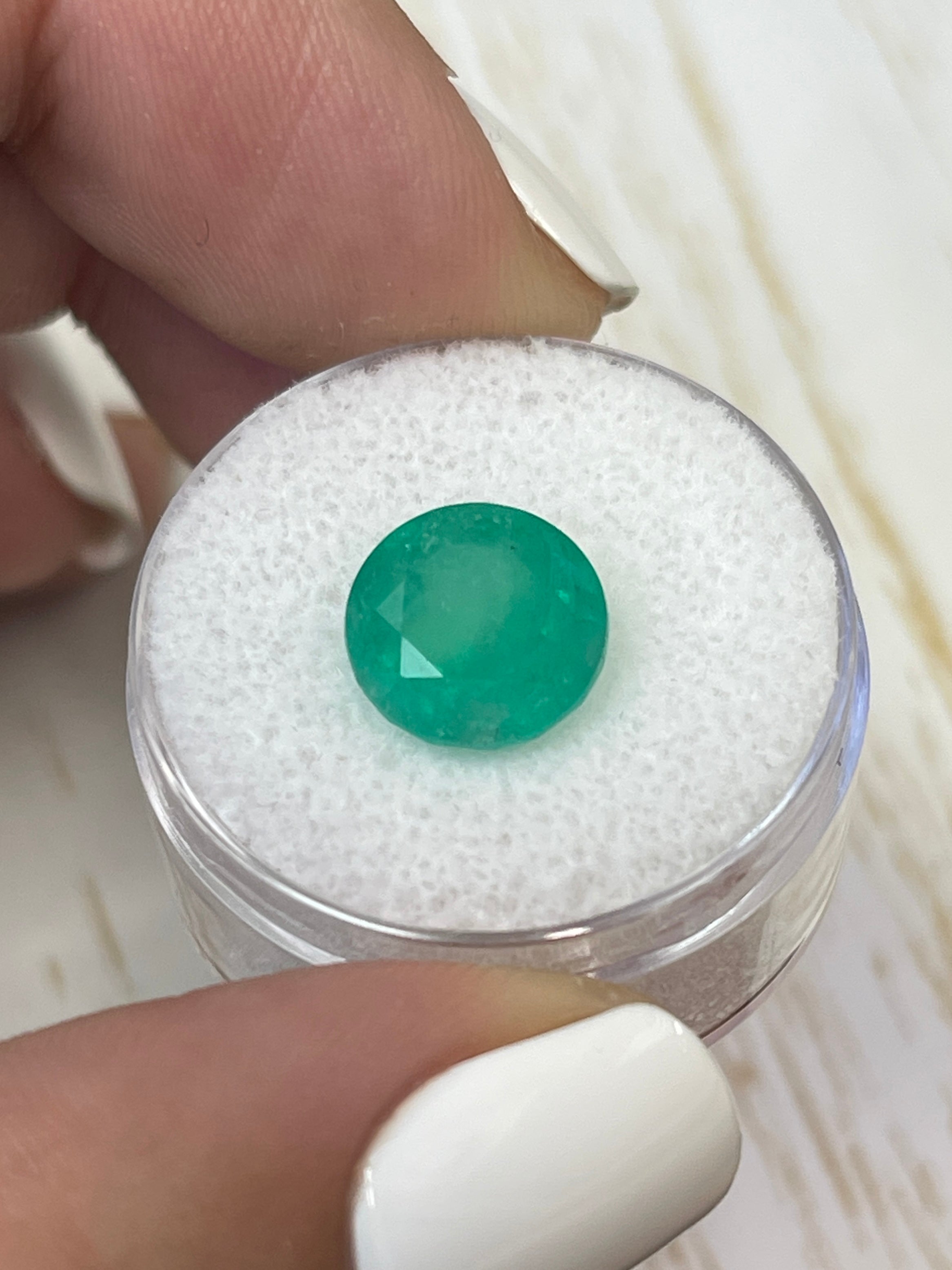 Medium green 4.42 carat round natural Colombian emerald loose gemstone from JR Colombian Emeralds.