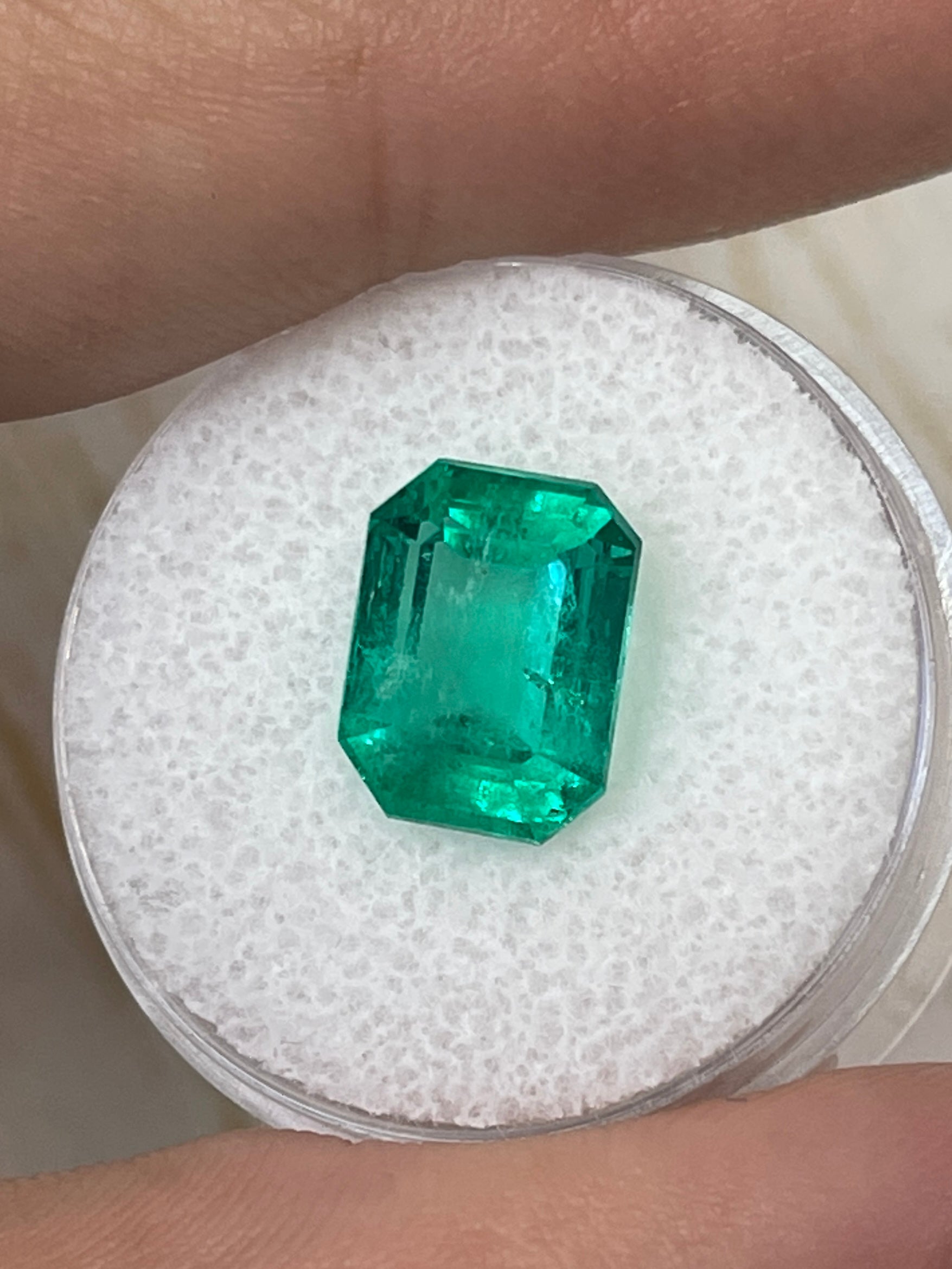 Natural loose Colombian emerald, 4.64 carats, 11x9mm, vivid bluish green, emerald cut, from JR Colombian Emeralds.