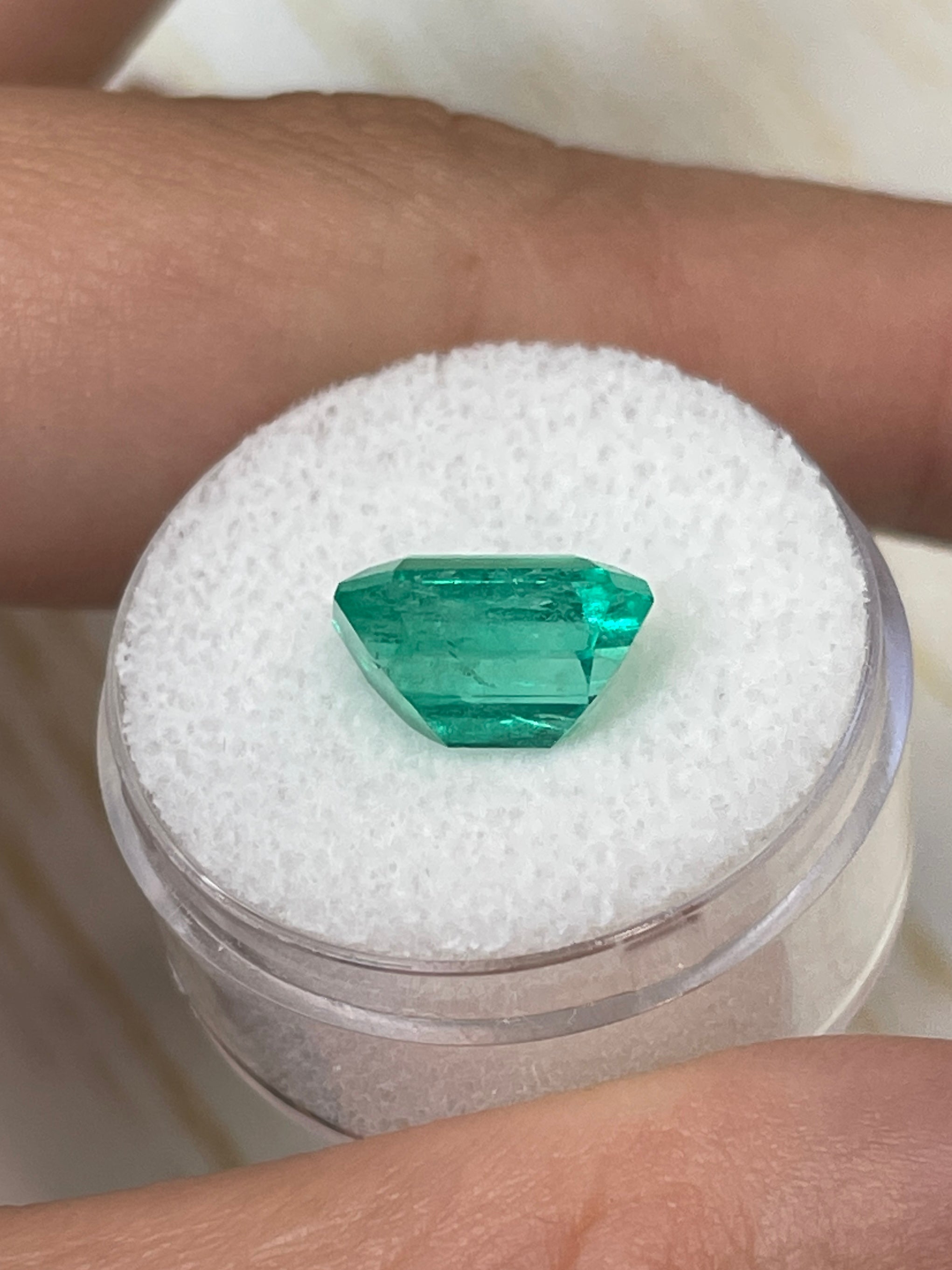 Natural loose Colombian emerald, 4.64 carats, 11x9 mm, vibrant bluish-green, emerald cut, from JR Colombian Emeralds.