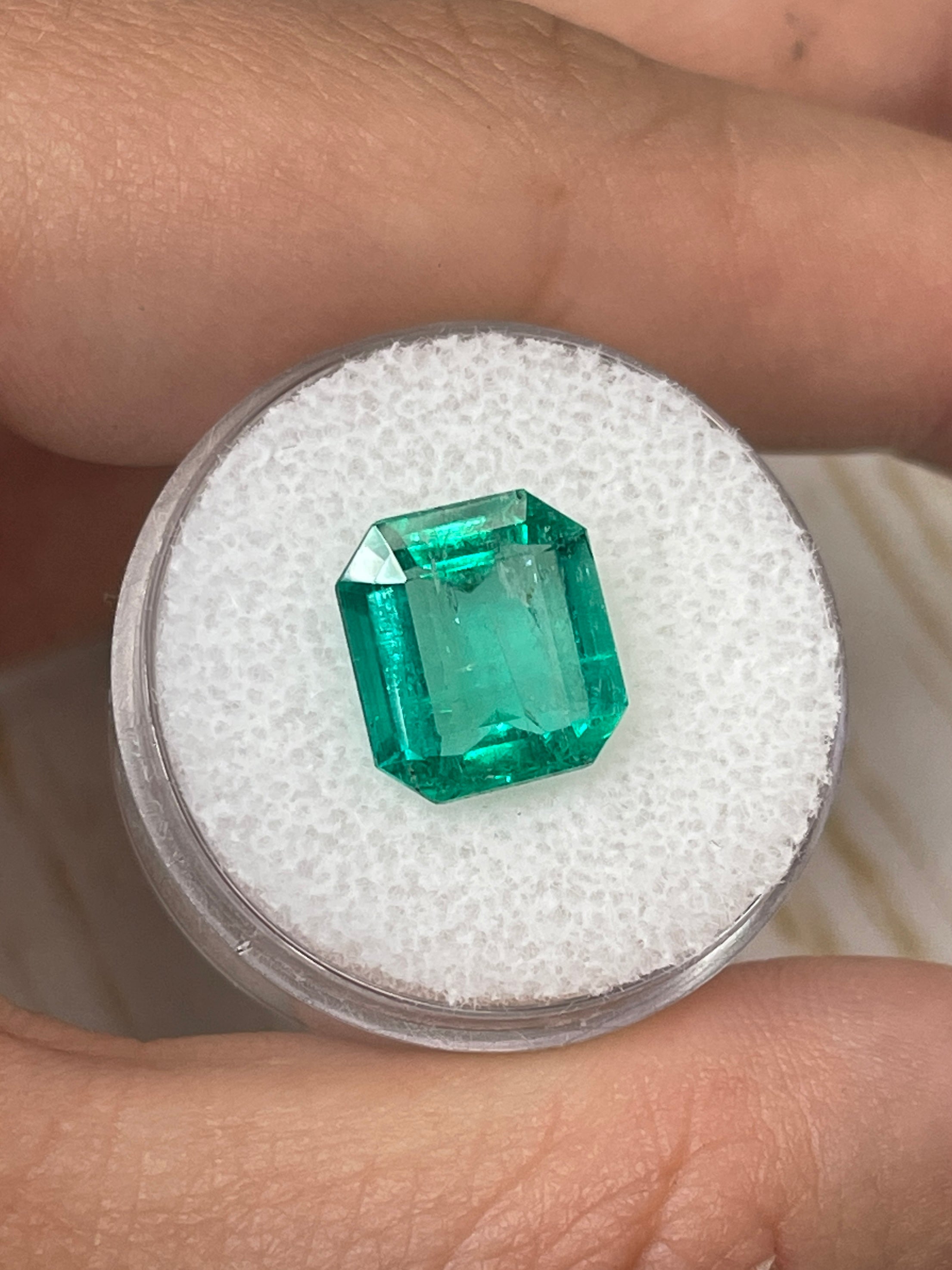 4.72 carat bluish natural Colombian emerald loose gemstone, Asscher cut, with a spready 11x10 mm size, from JR Colombian Emeralds.
