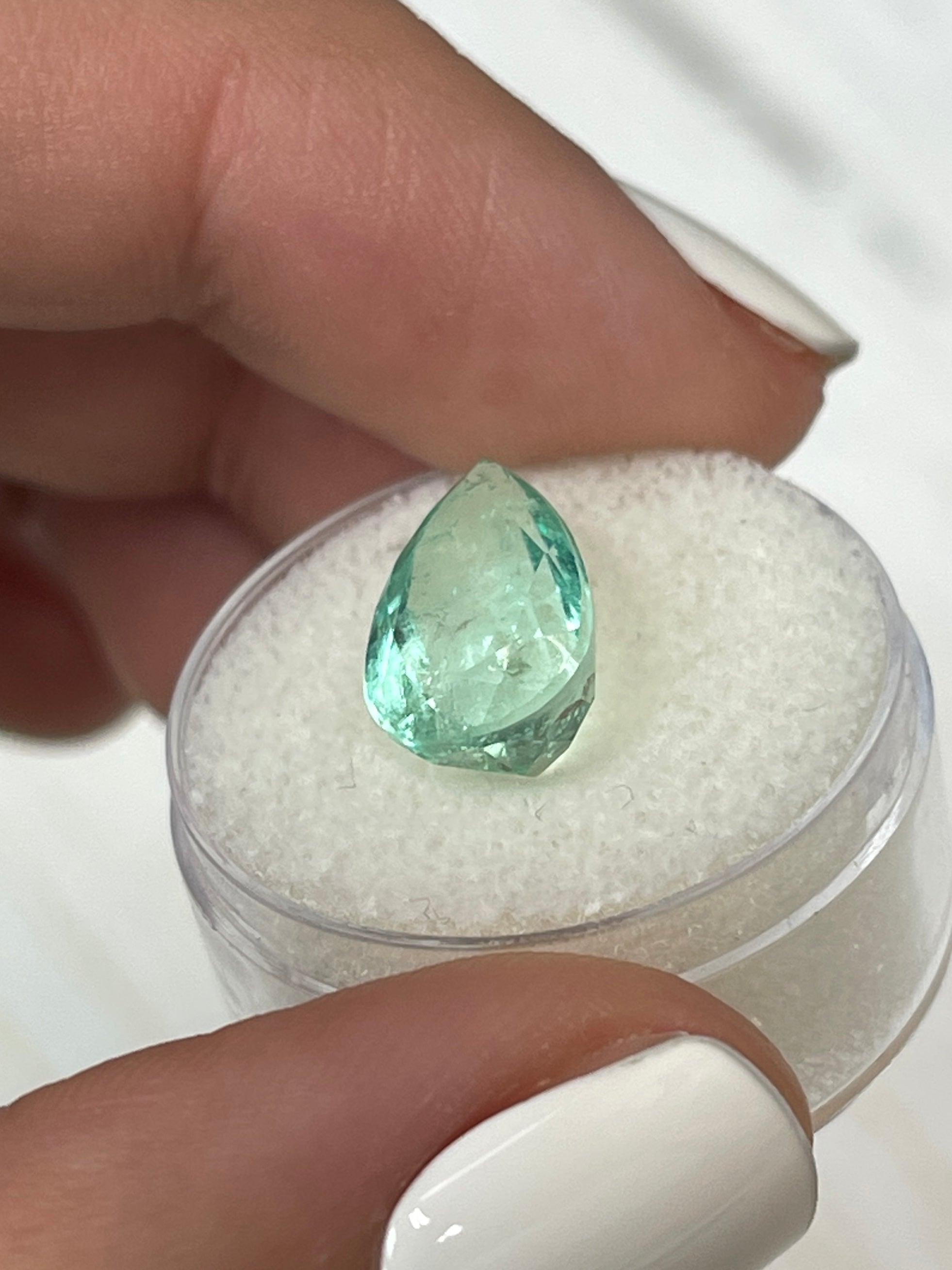 Light green natural Colombian emerald loose gemstone, pear cut, 5.57 carats, from JR Colombian Emeralds.