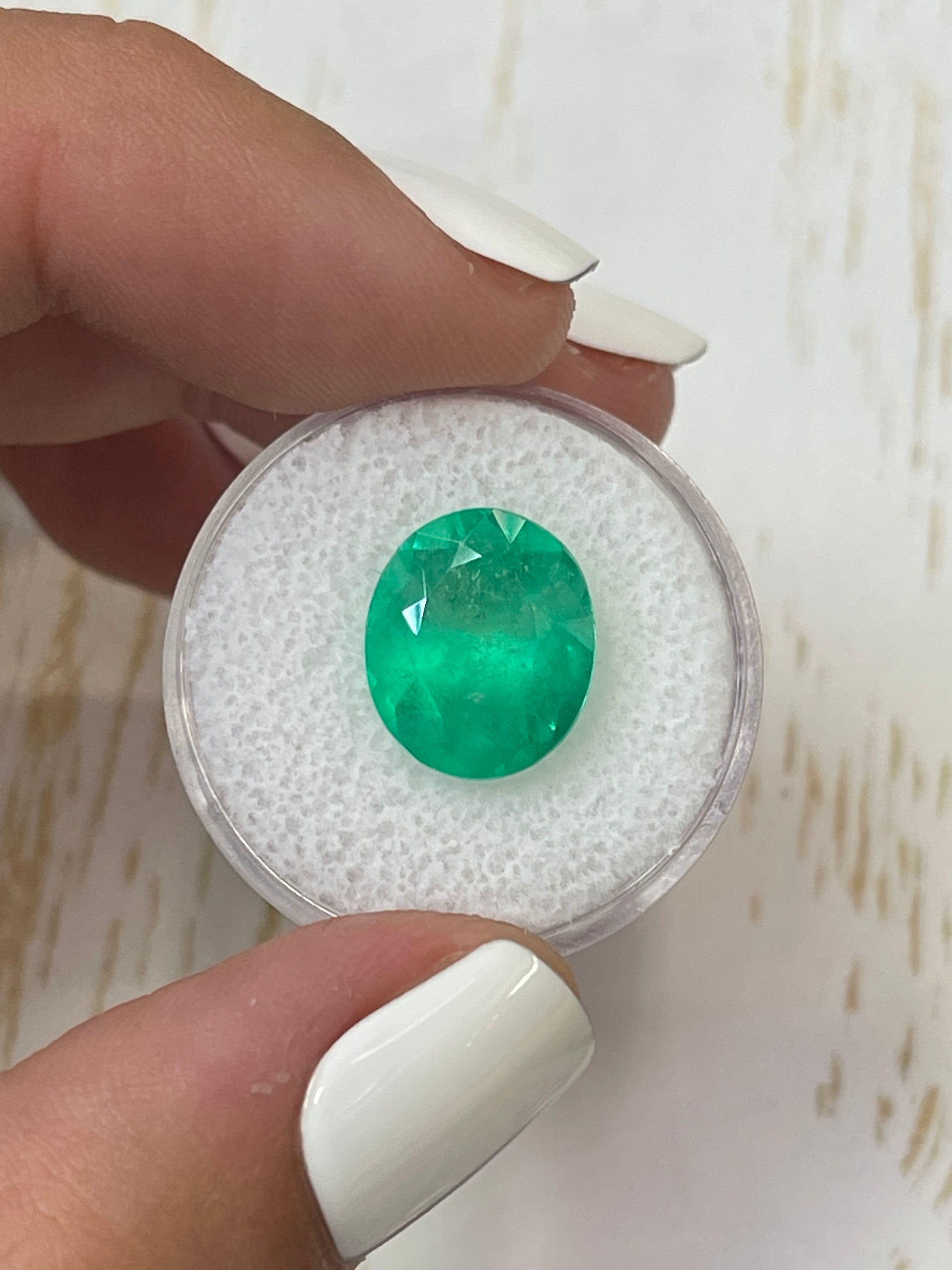 6.35-carat neon green natural Colombian emerald, oval cut, loose gemstone from JR Colombian Emeralds.